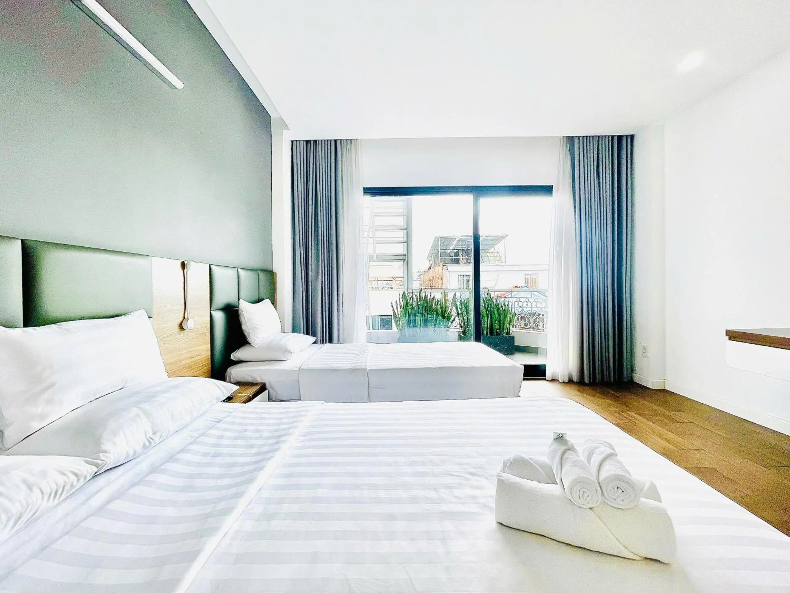 Bed in Royal Dragon Boutique Hotel