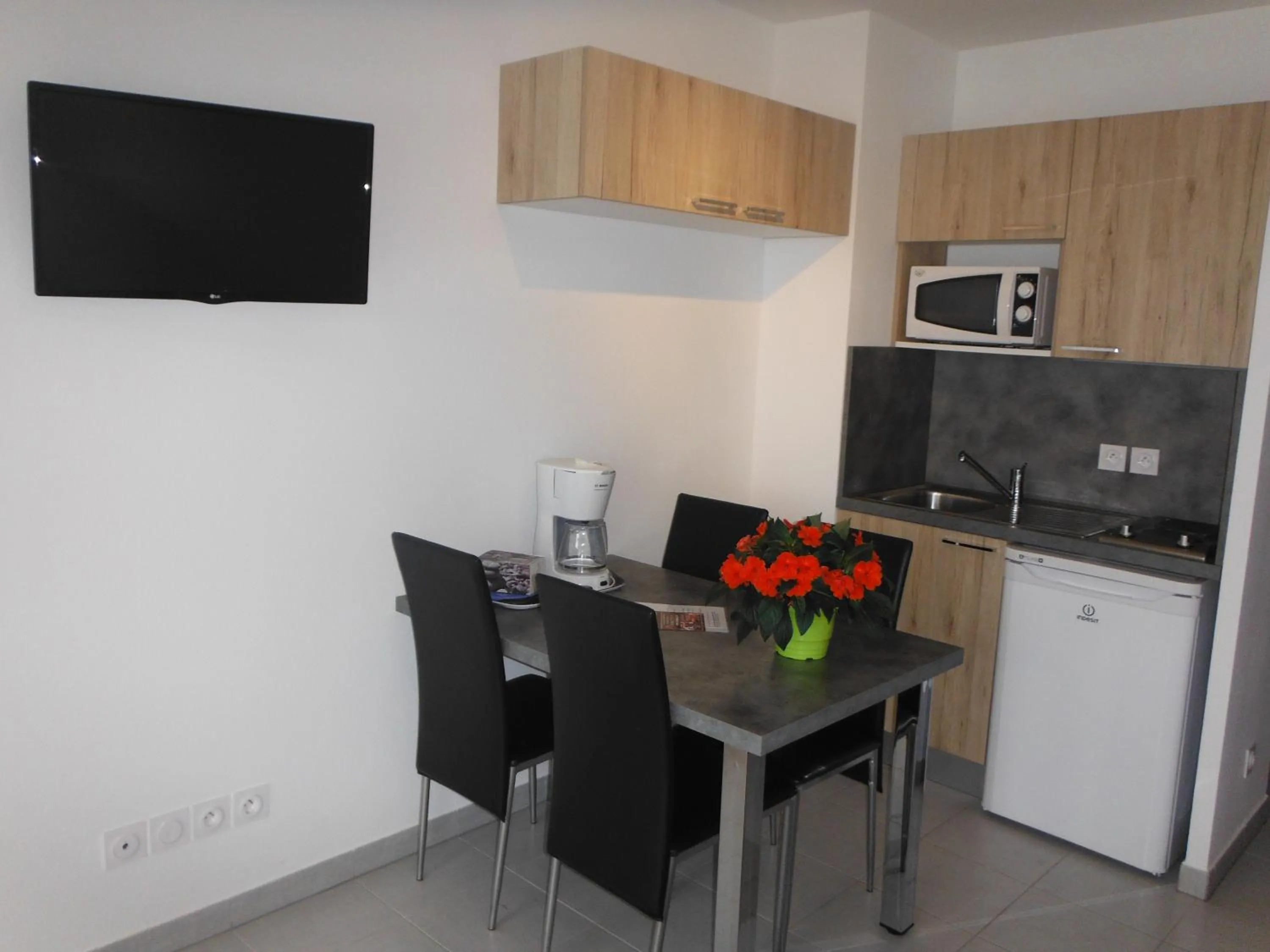 Kitchen or kitchenette in Résidence L'éléphant