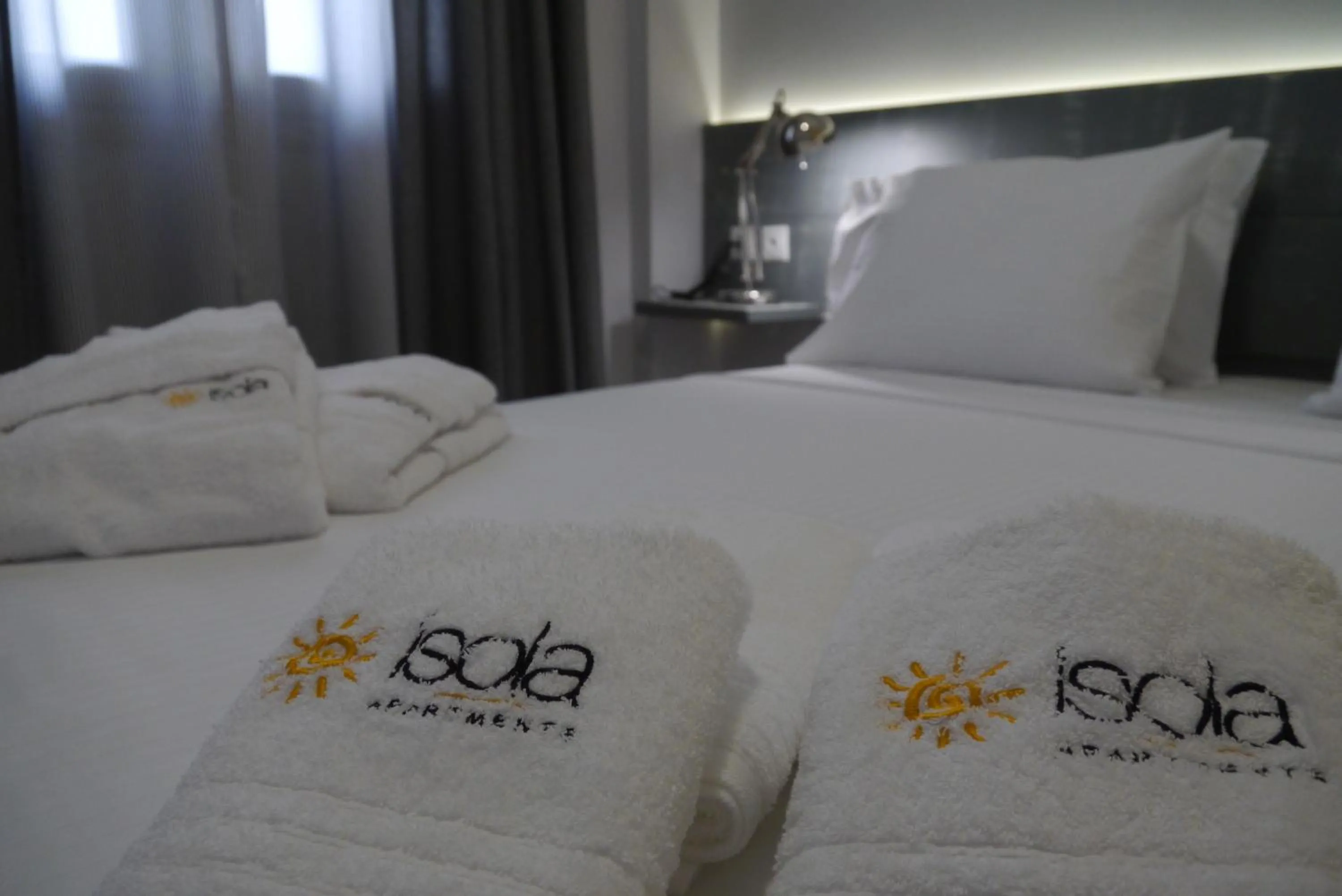 Decorative detail, Bed in Isola Apartments
