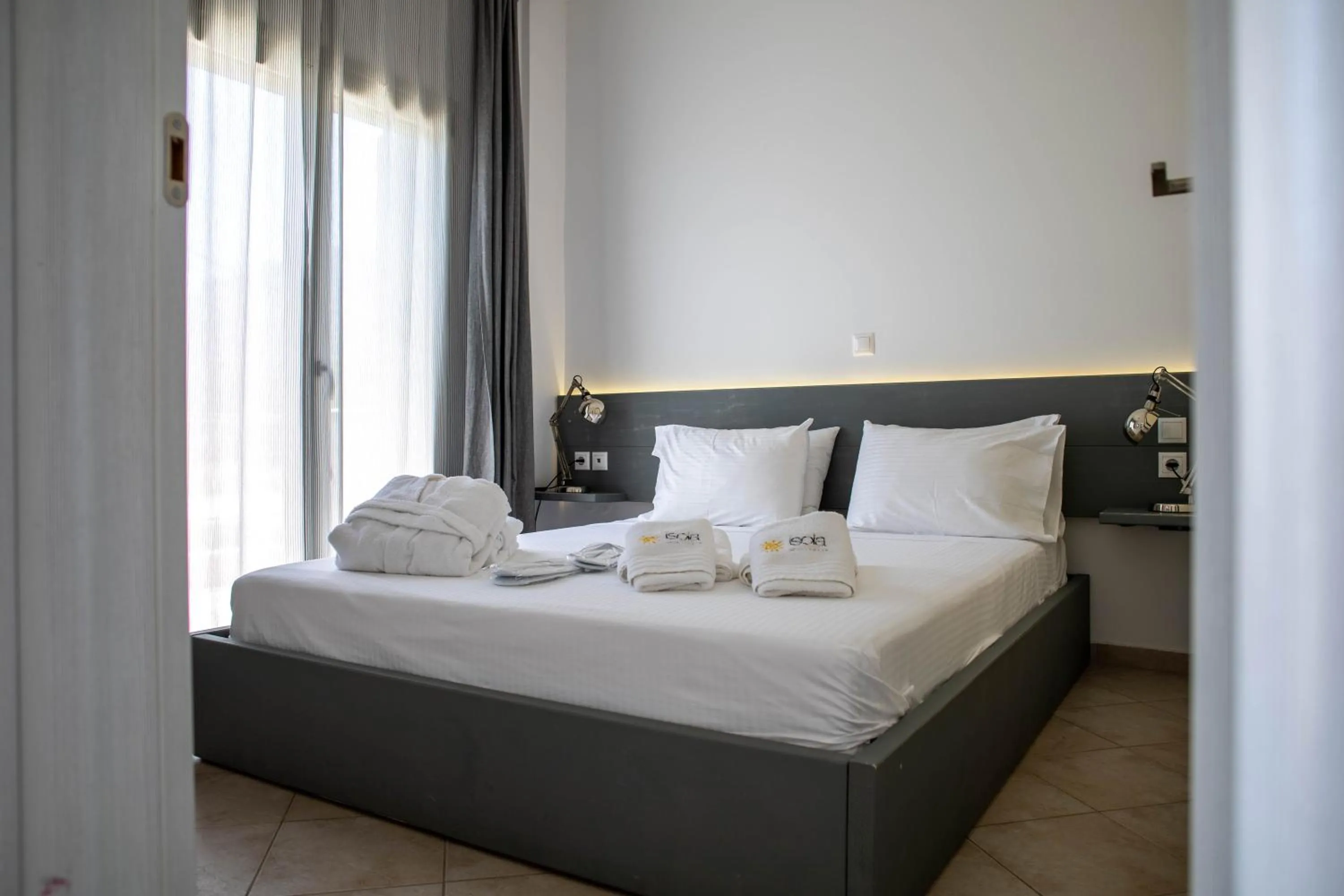 Bed in Isola Apartments
