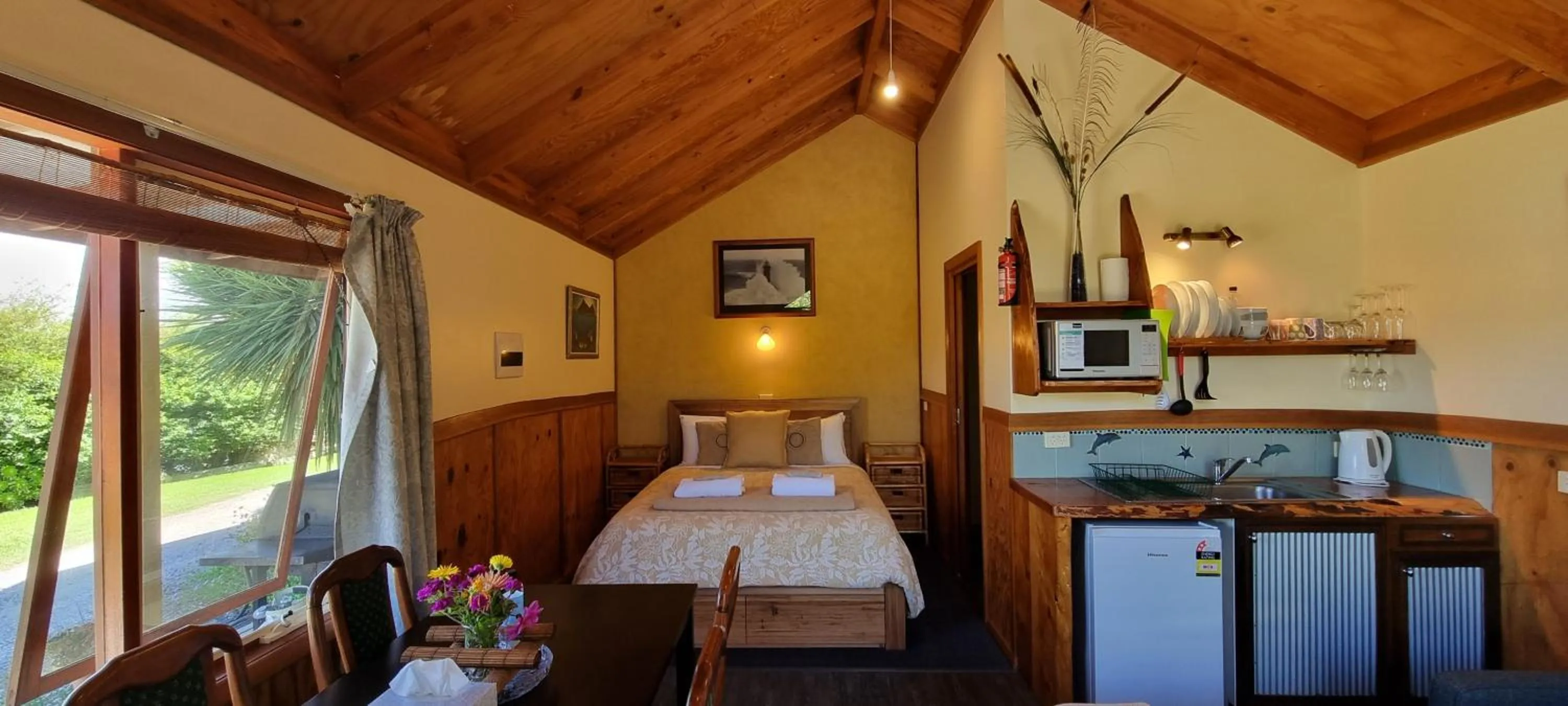 Bed in Eastern Reef Cottages