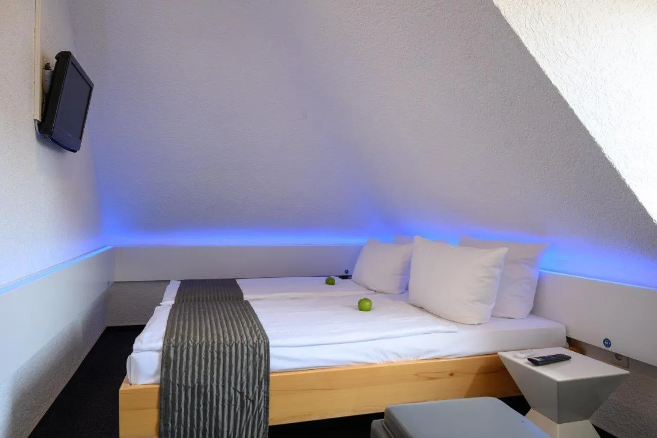 Bed in Hotel Heymann