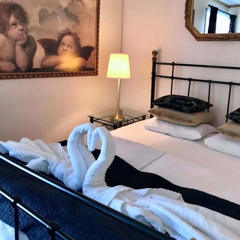 Bed in Reenskaug Hotel