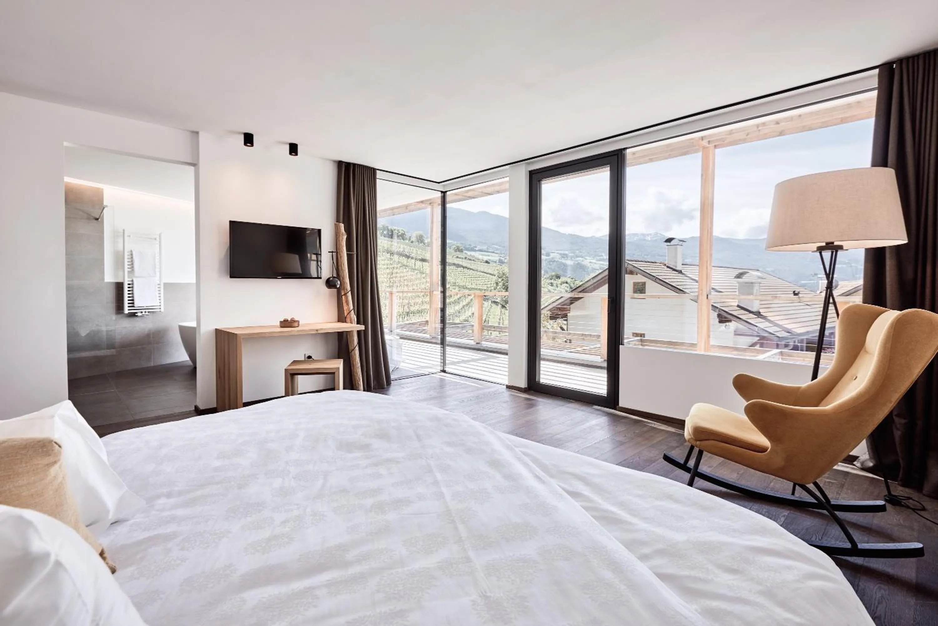 Bed in Haller Suites & Restaurant