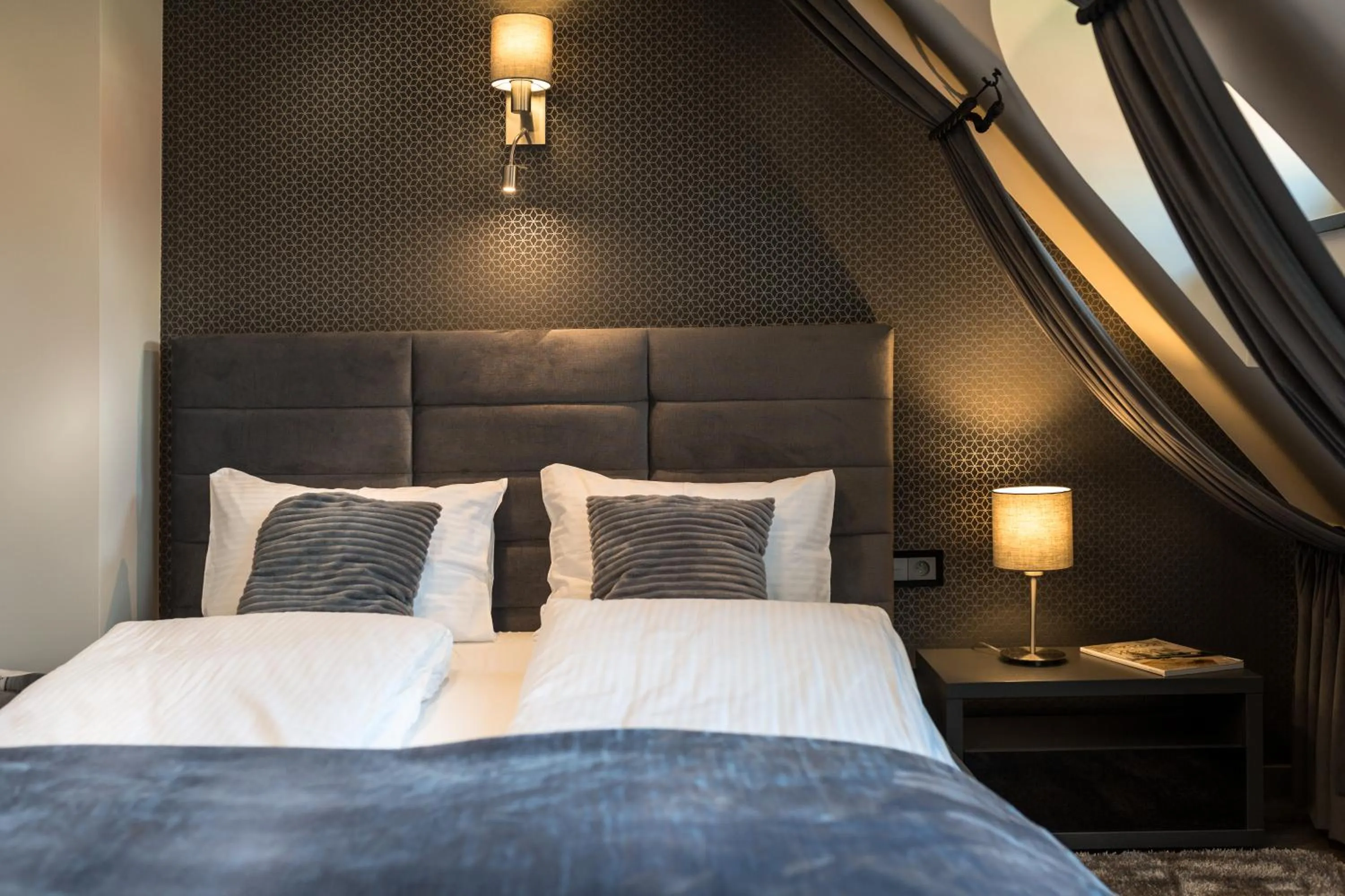 Bed in Aparthotel New Lux