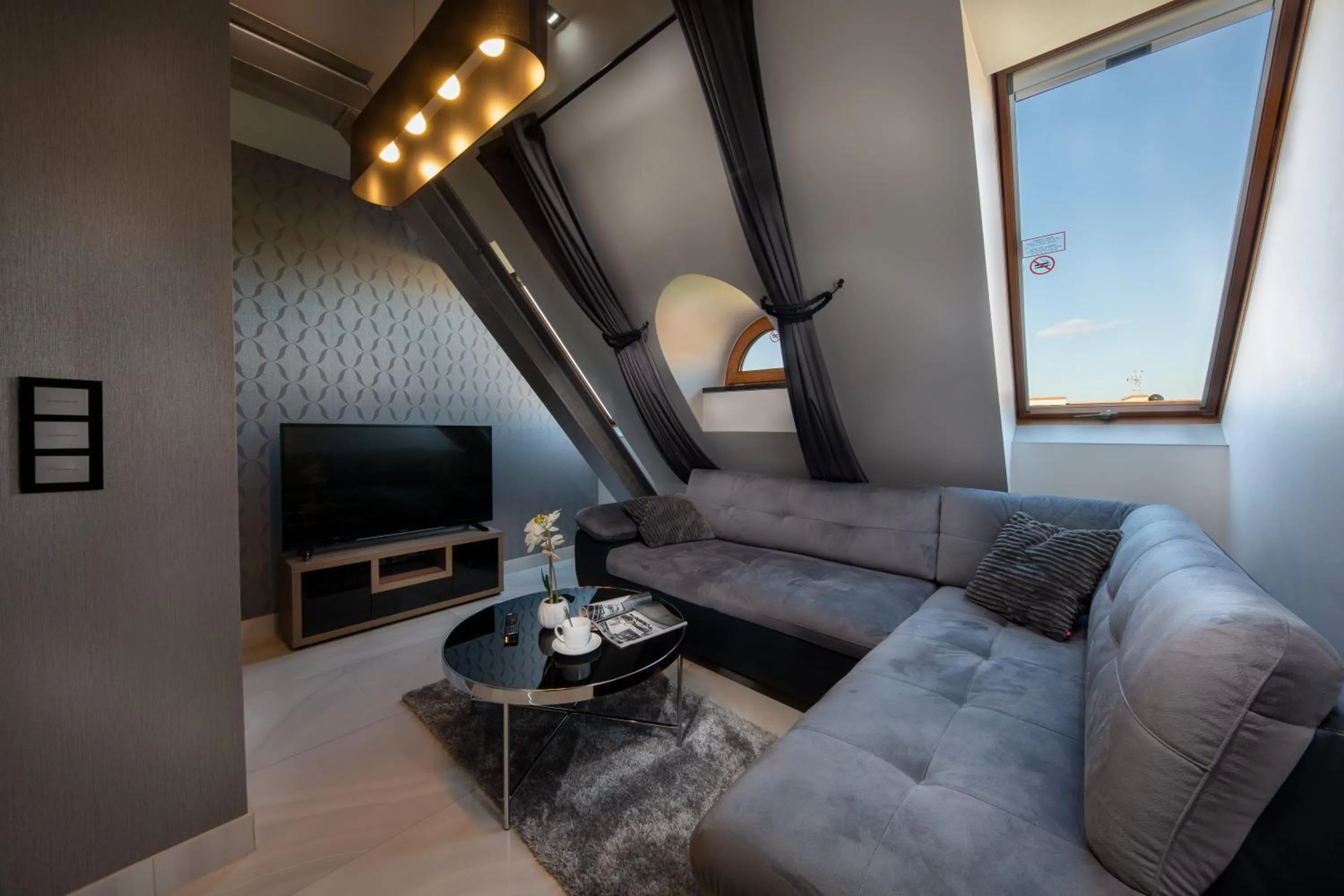 Communal lounge/ TV room in Aparthotel New Lux