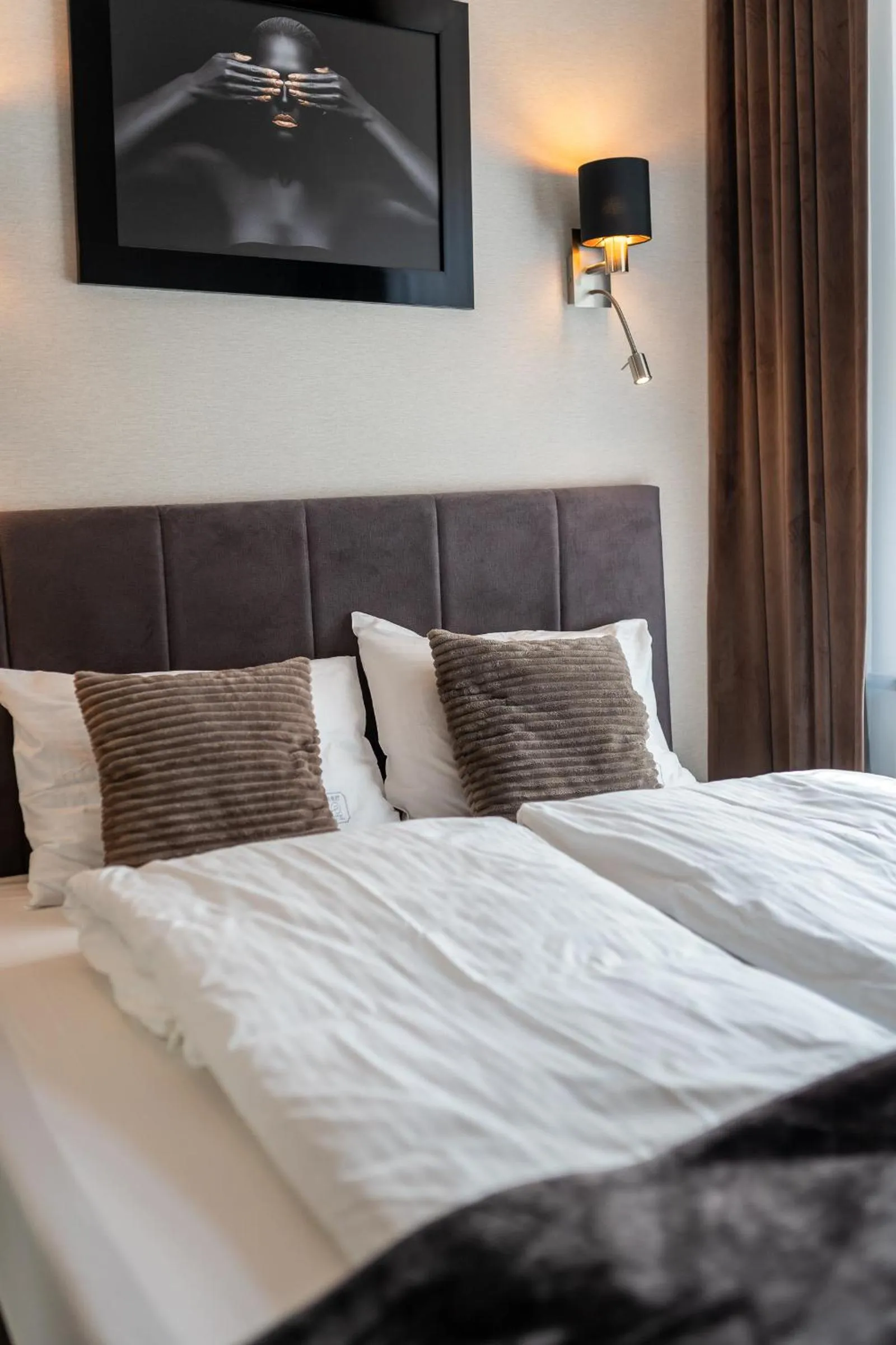 Bed in Aparthotel New Lux