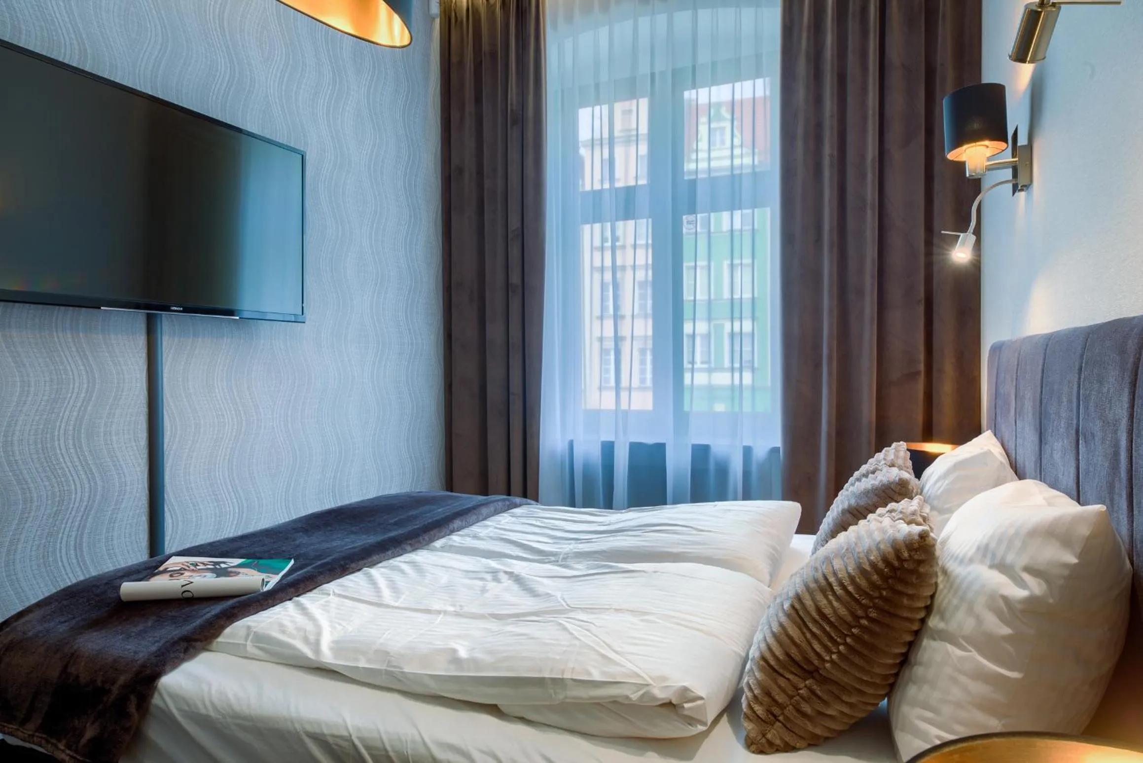 Bed in Aparthotel New Lux