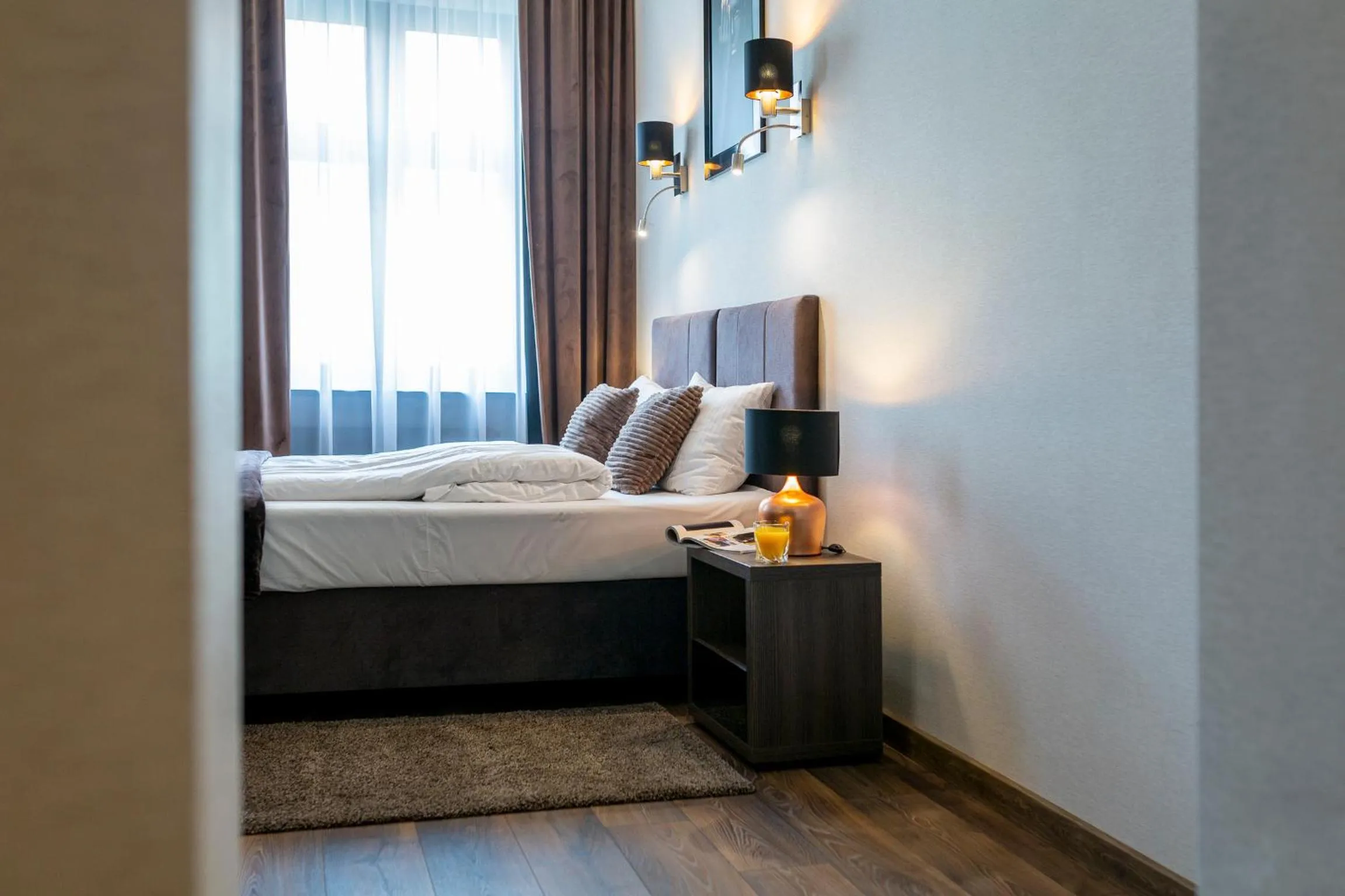 Bed in Aparthotel New Lux