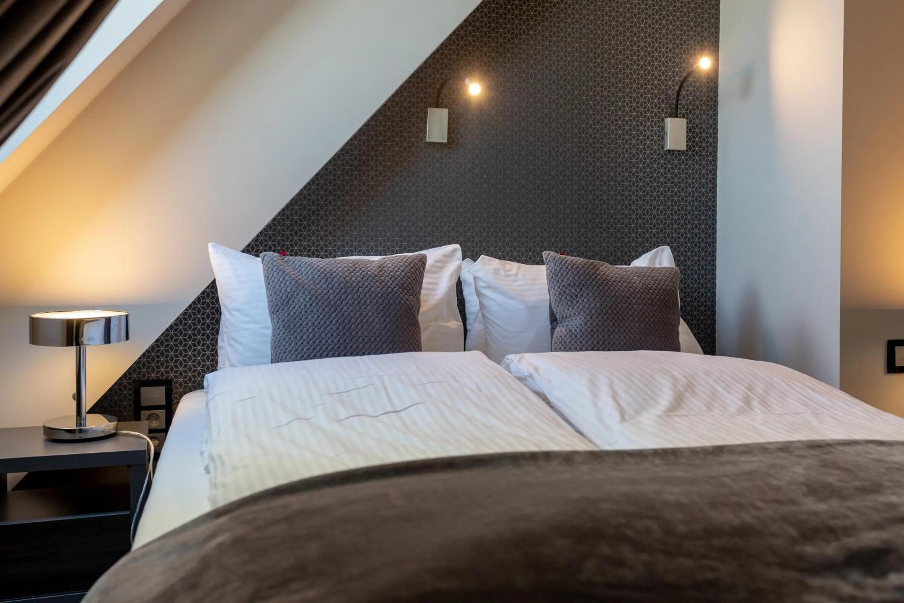 Bed in Aparthotel New Lux