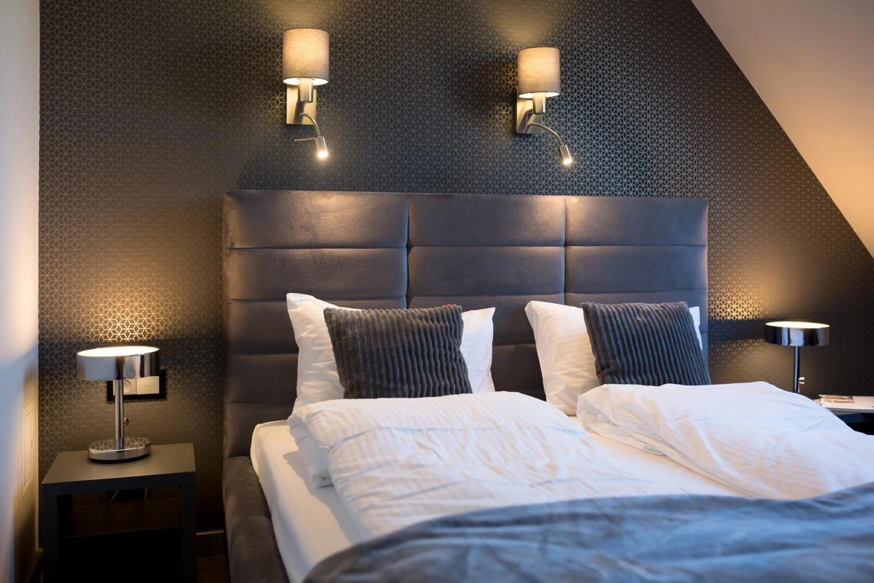 Bed in Aparthotel New Lux