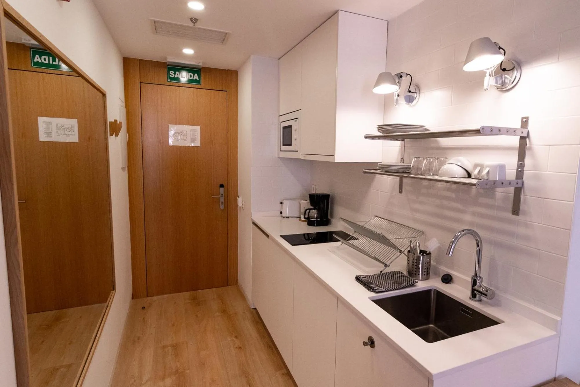 Kitchen or kitchenette in Plaza Mayor Suites & Apartments