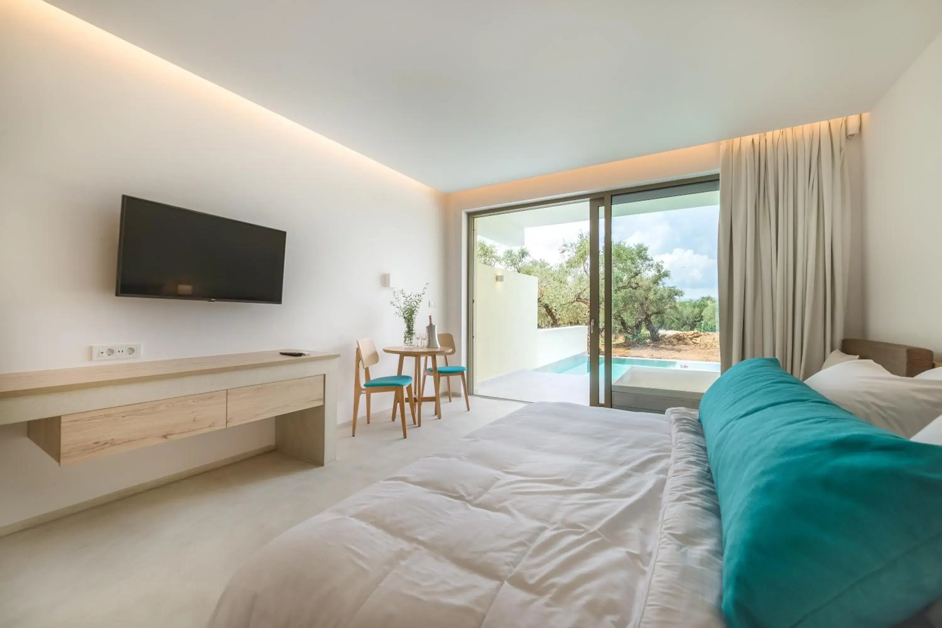 Seating area, Bed in Tsamis Zante Suites Seating area, Bed in Tsamis Zante Suites