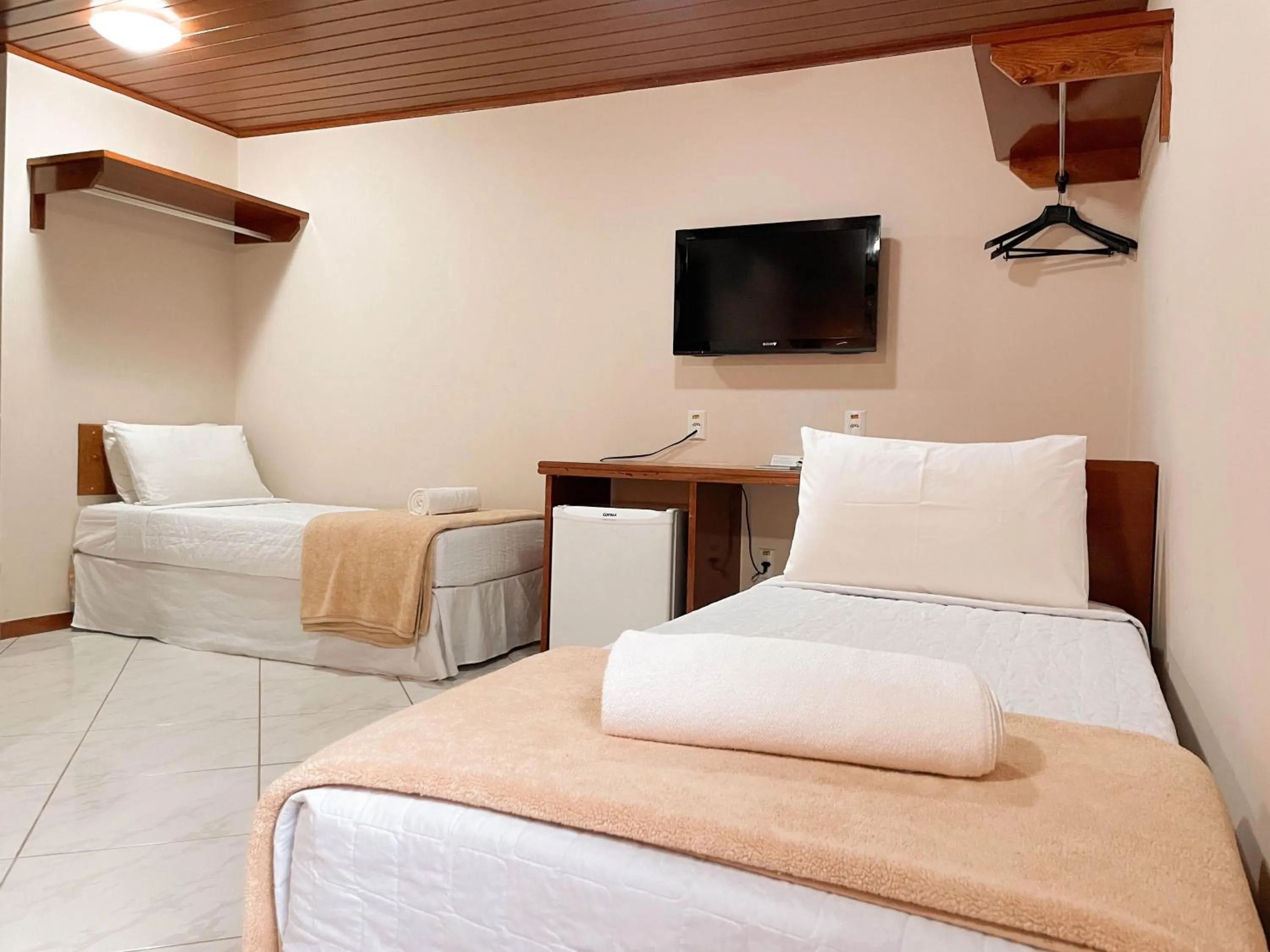 Bed in Hotel Fazenda China Park