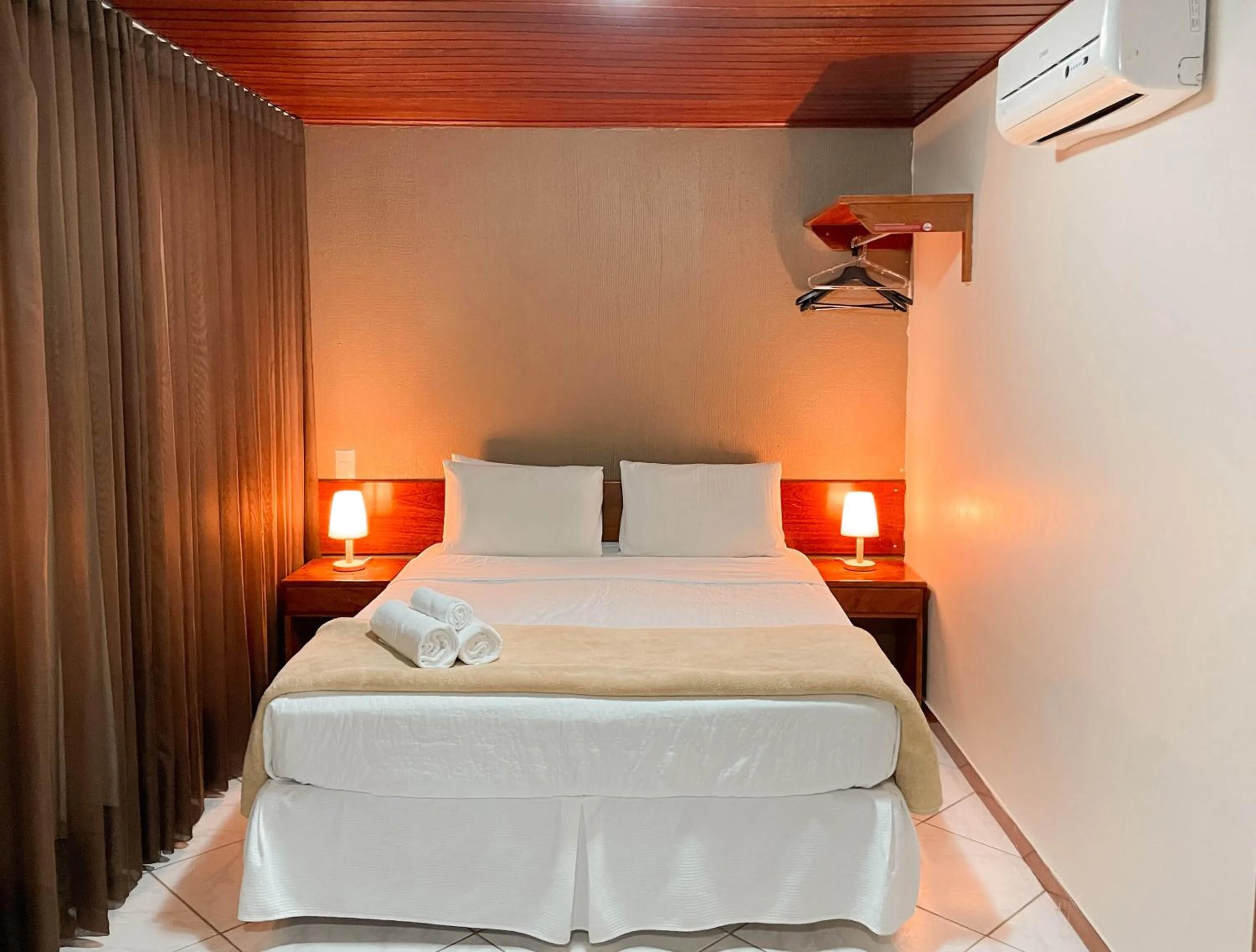 Bed in Hotel Fazenda China Park