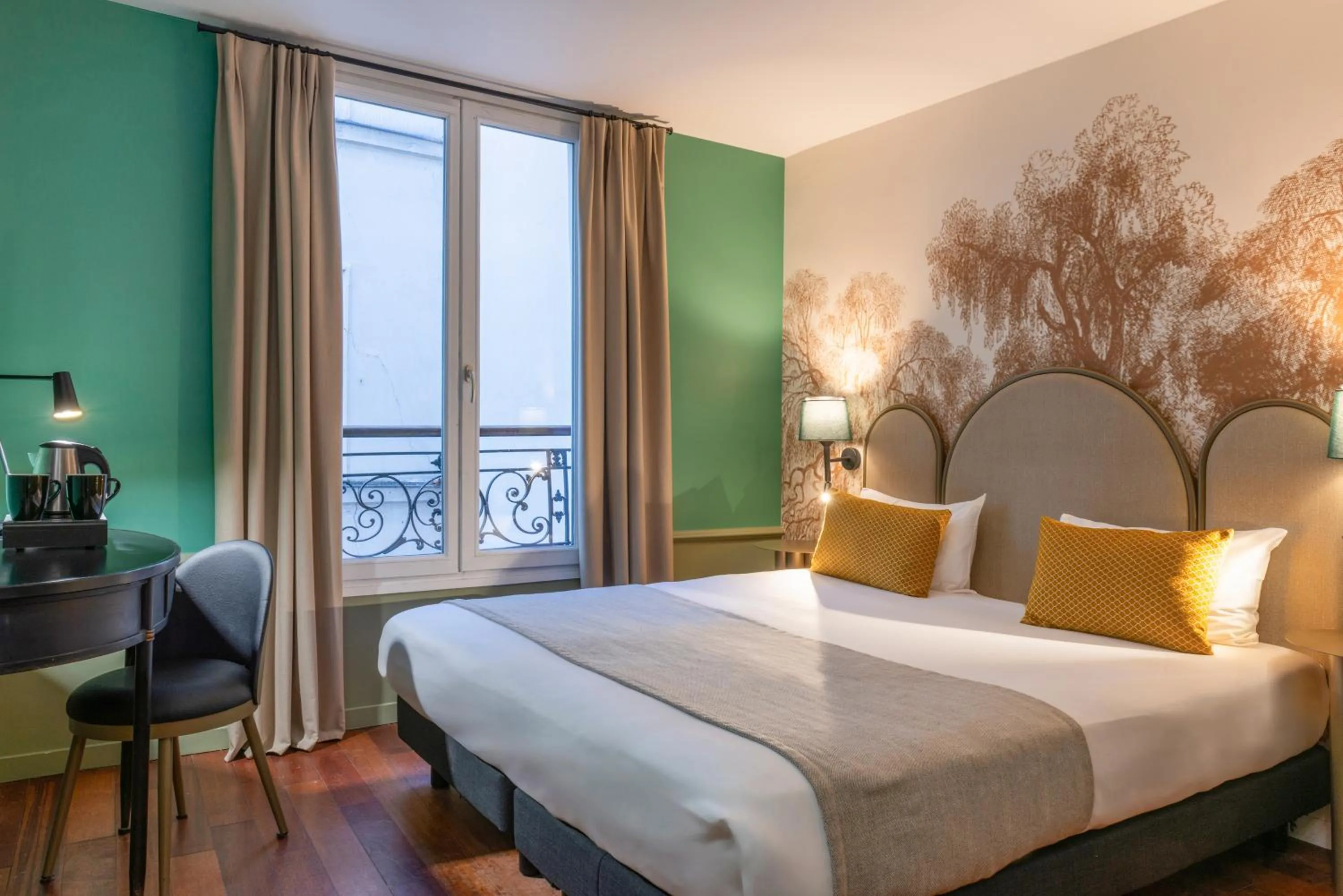 Bed in Appart Hotel Avalon