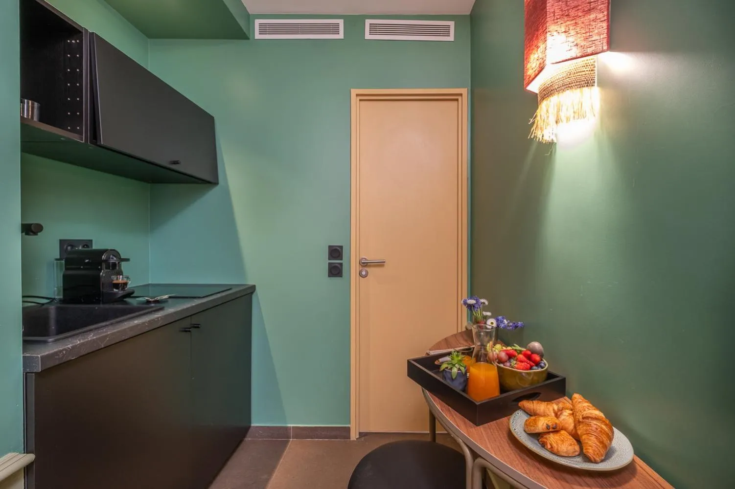 Kitchen or kitchenette in Appart Hotel Avalon