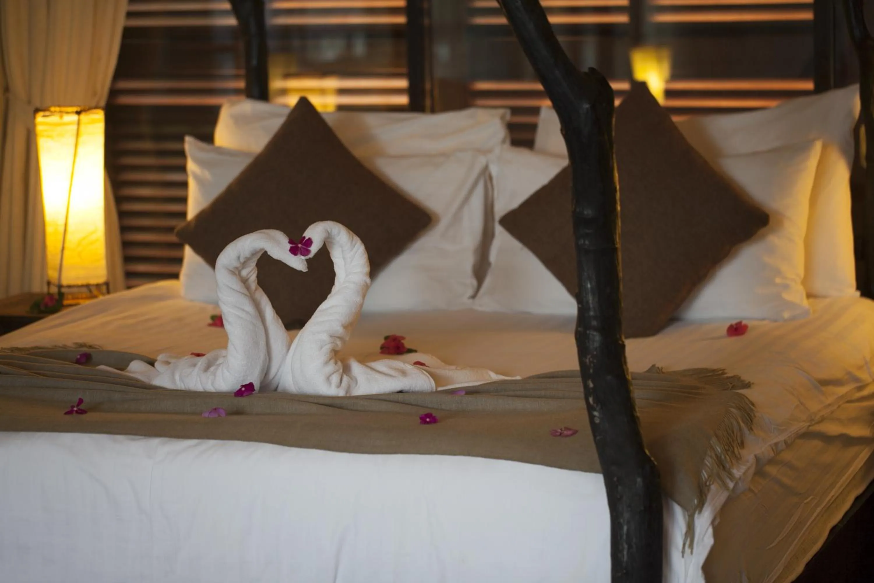 Bed in Dhevatara Beach Hotel