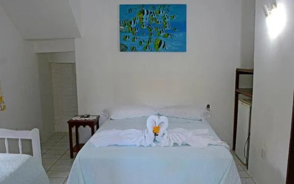 Bed in Pousada 4 Ventos