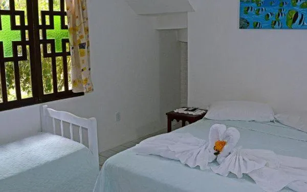 Bed in Pousada 4 Ventos