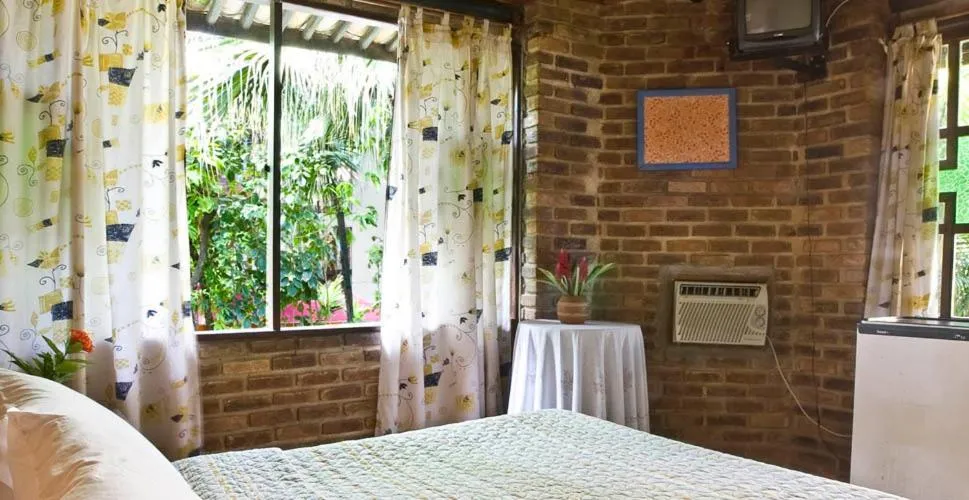 Bed in Pousada 4 Ventos