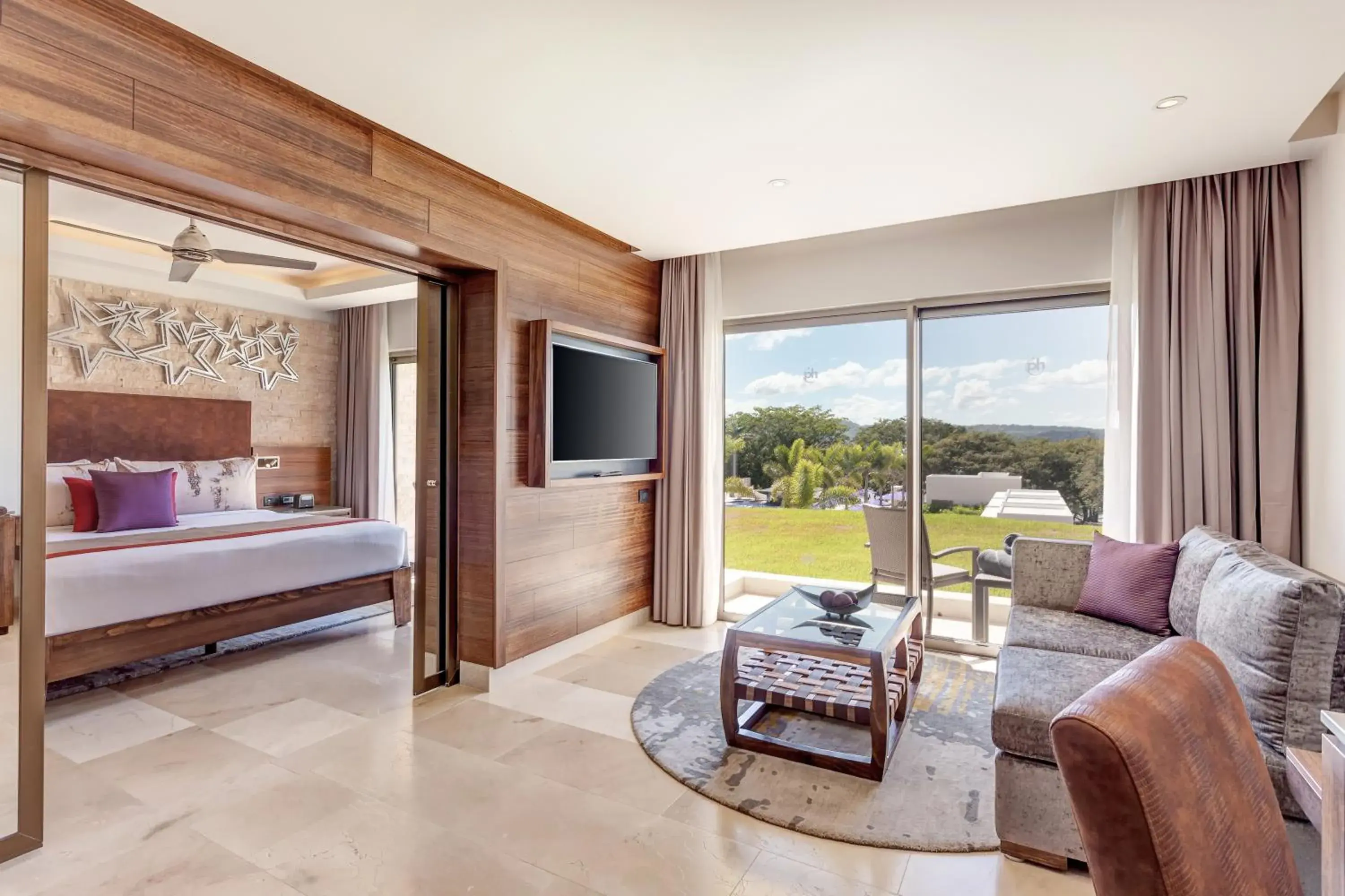 Living room, Bed in Planet Hollywood Costa Rica by Royalton, An Autograph Collection All-Inclusive Resort Living room, Bed in Planet Hollywood Costa Rica by Royalton, An Autograph Collection All-Inclusive Resort