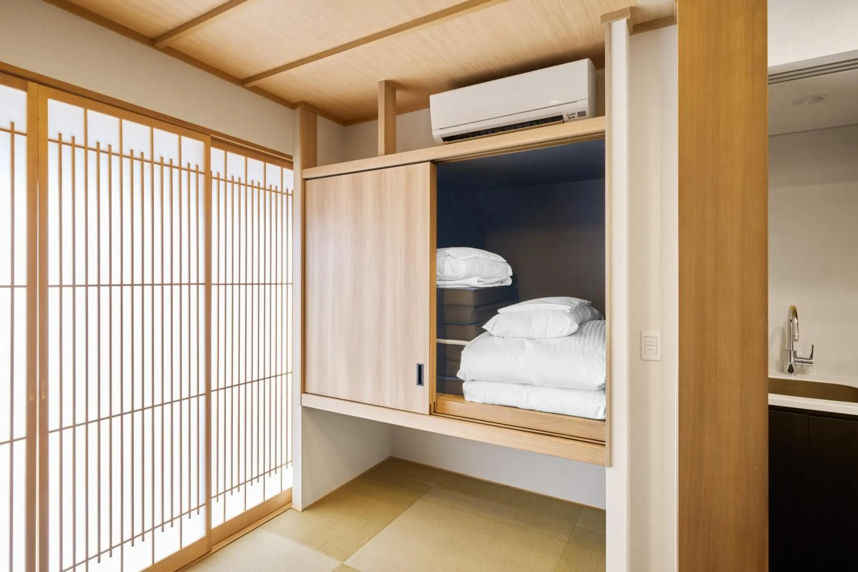 Bed in MIMARU Kyoto Shinmachi Sanjo Bed in MIMARU Kyoto Shinmachi Sanjo