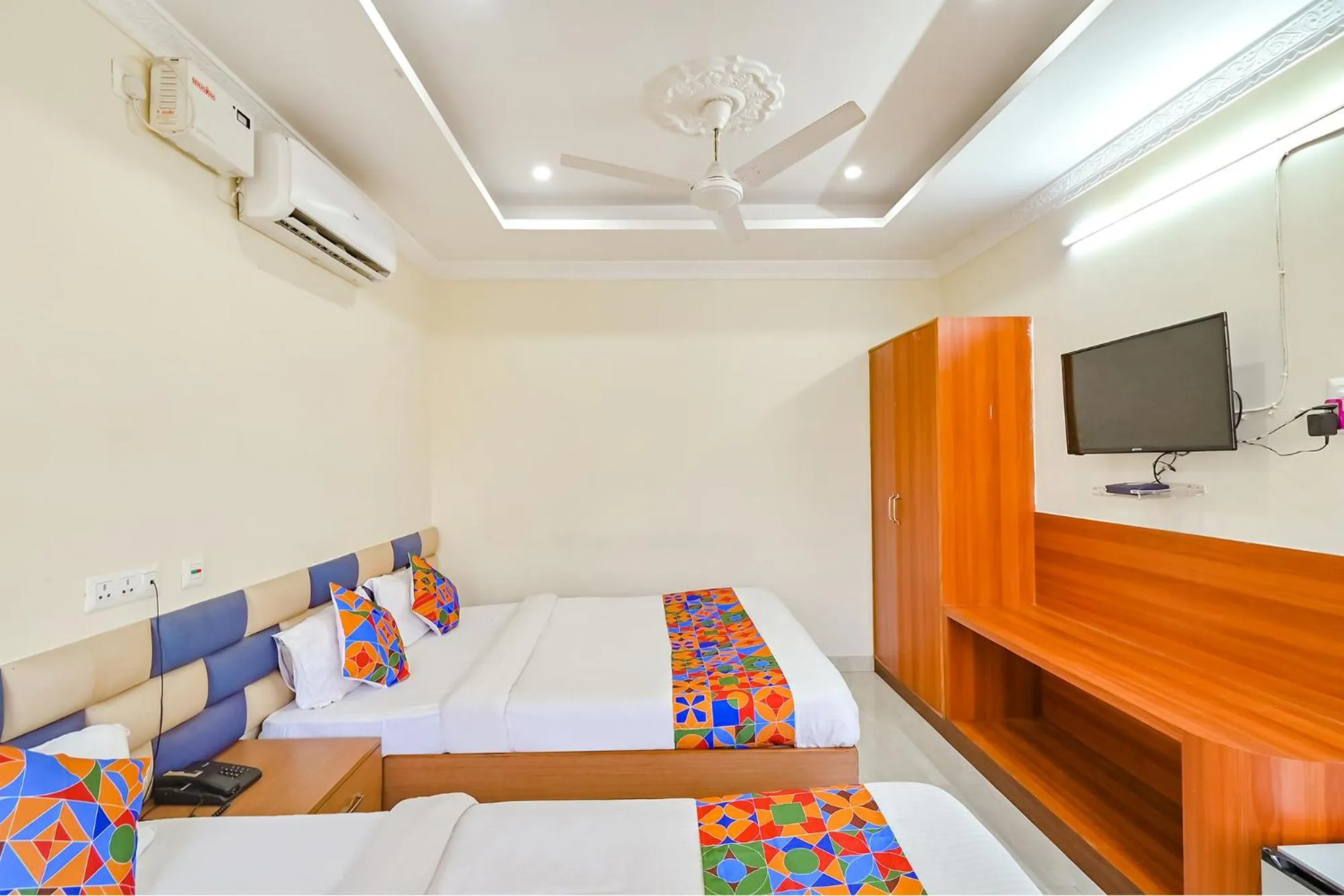 Bed in FabHotel Good Luck Residency