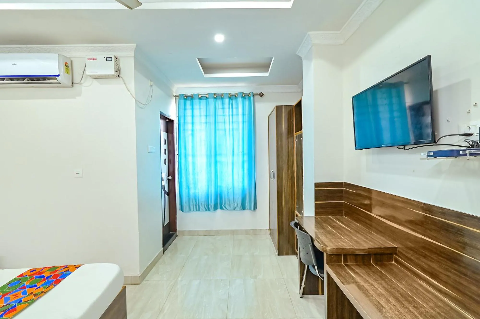 Bed in FabHotel Good Luck Residency