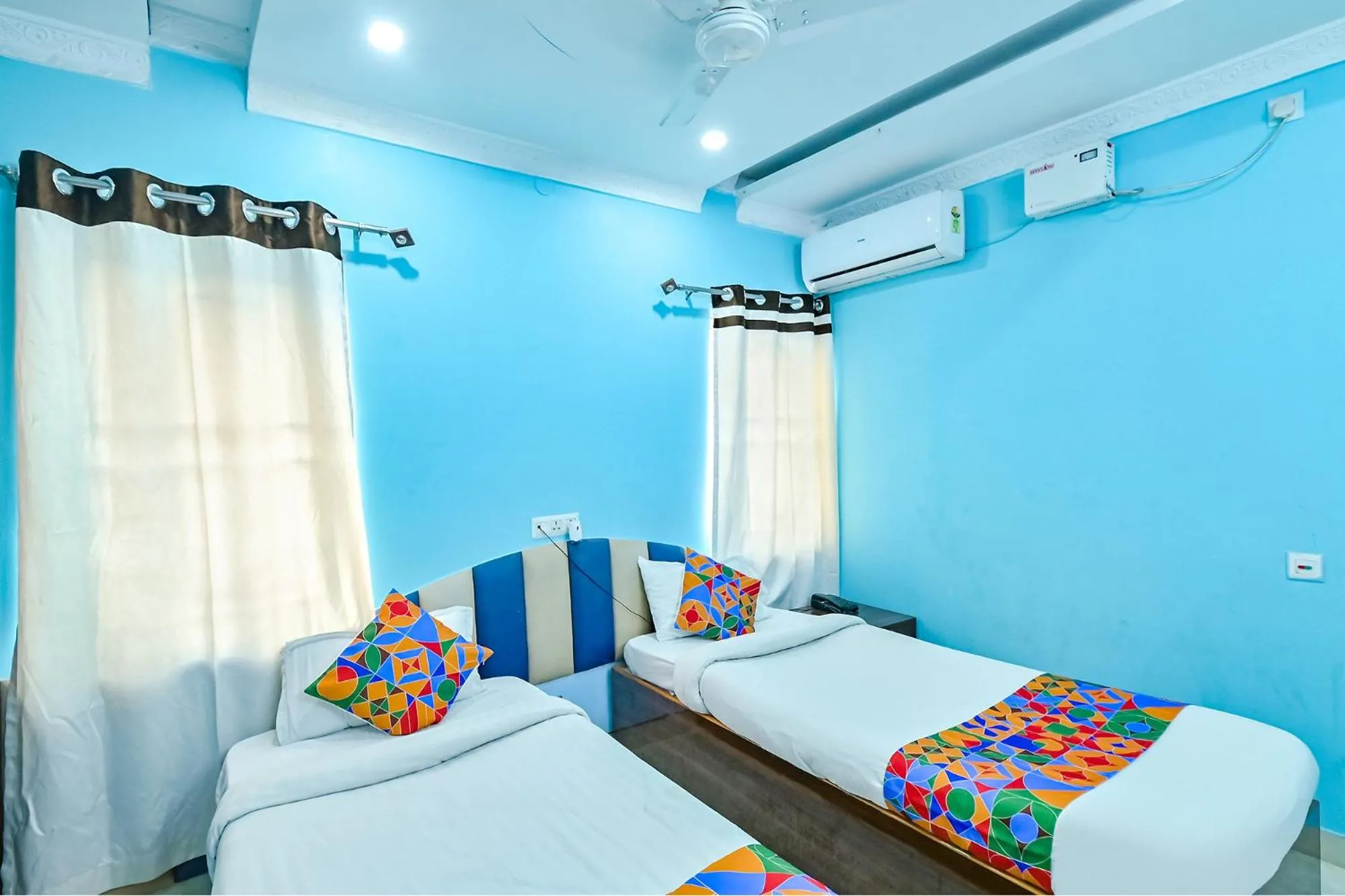 Bed in FabHotel Good Luck Residency