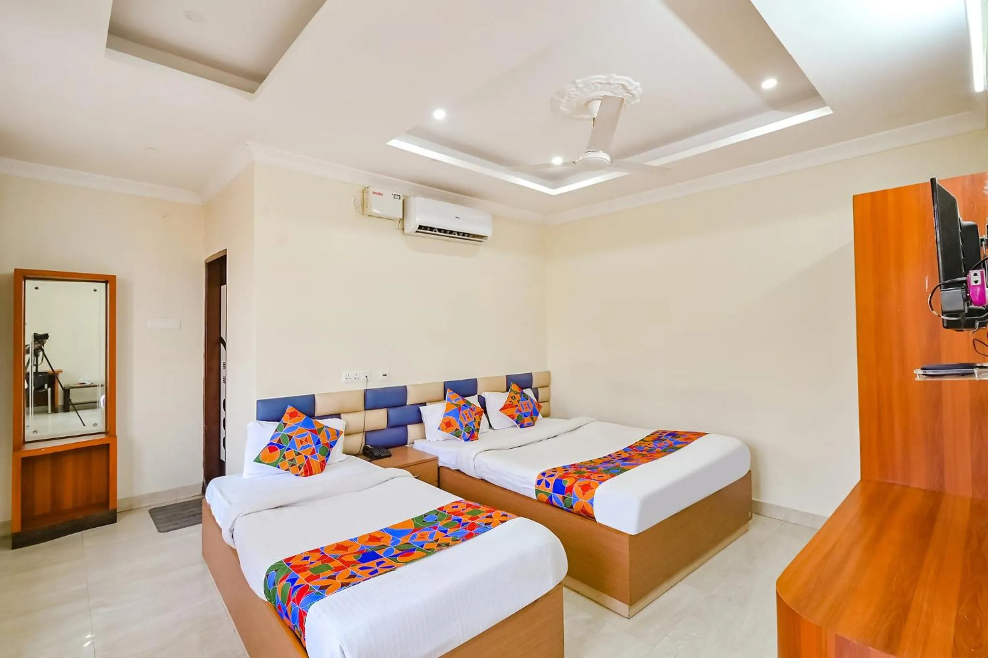 Bed in FabHotel Good Luck Residency