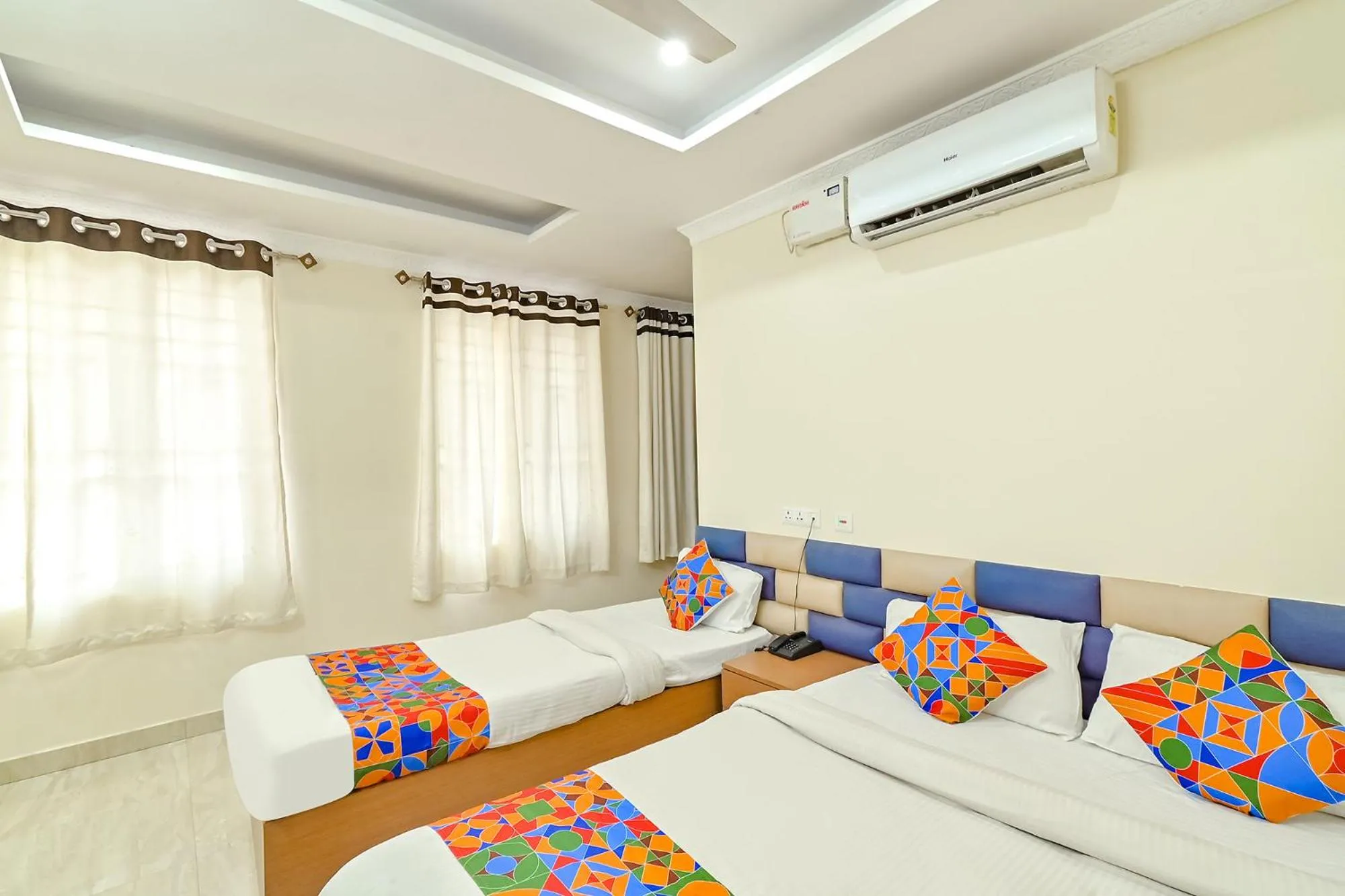 Bed in FabHotel Good Luck Residency