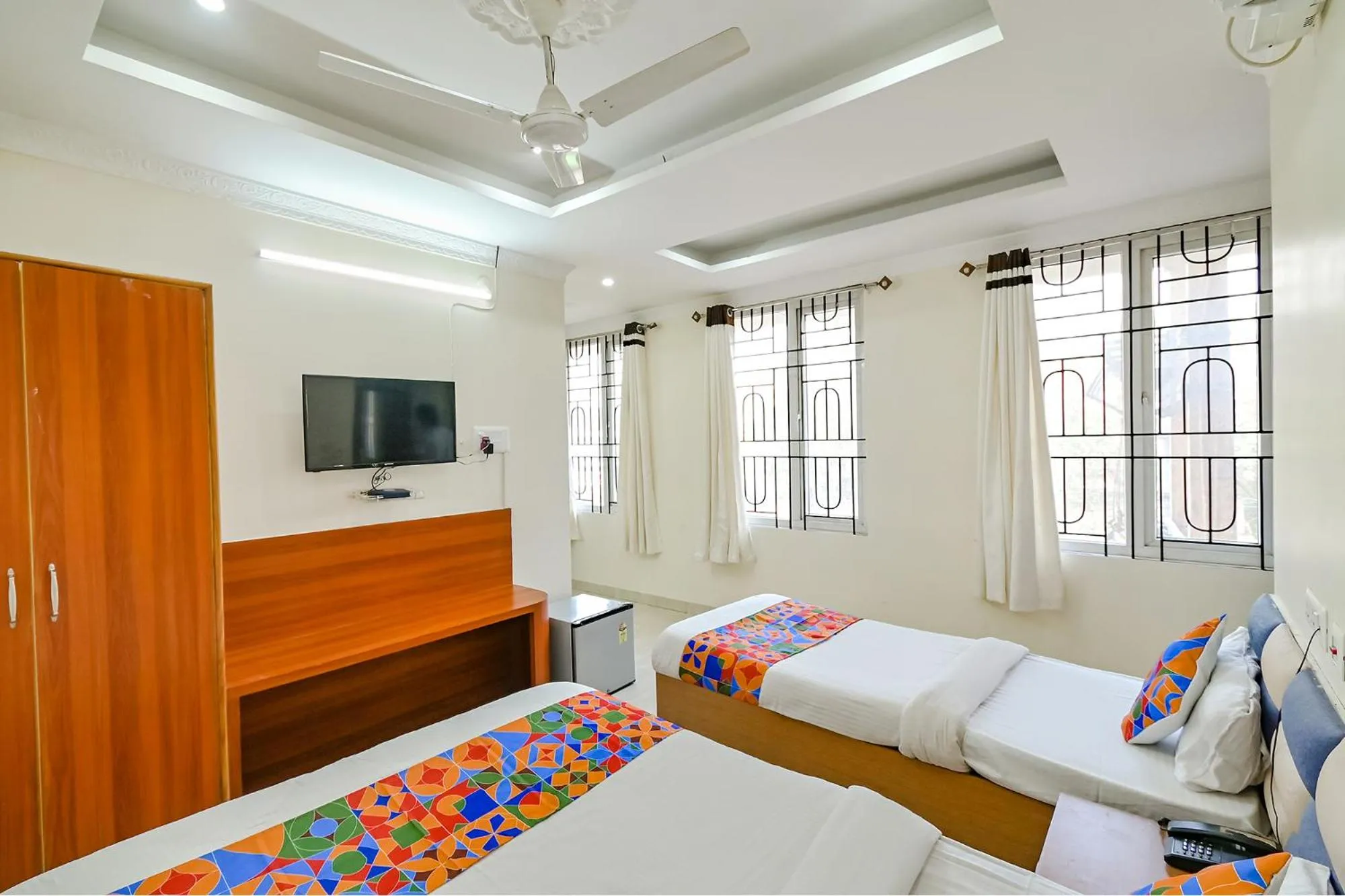 Bed in FabHotel Good Luck Residency