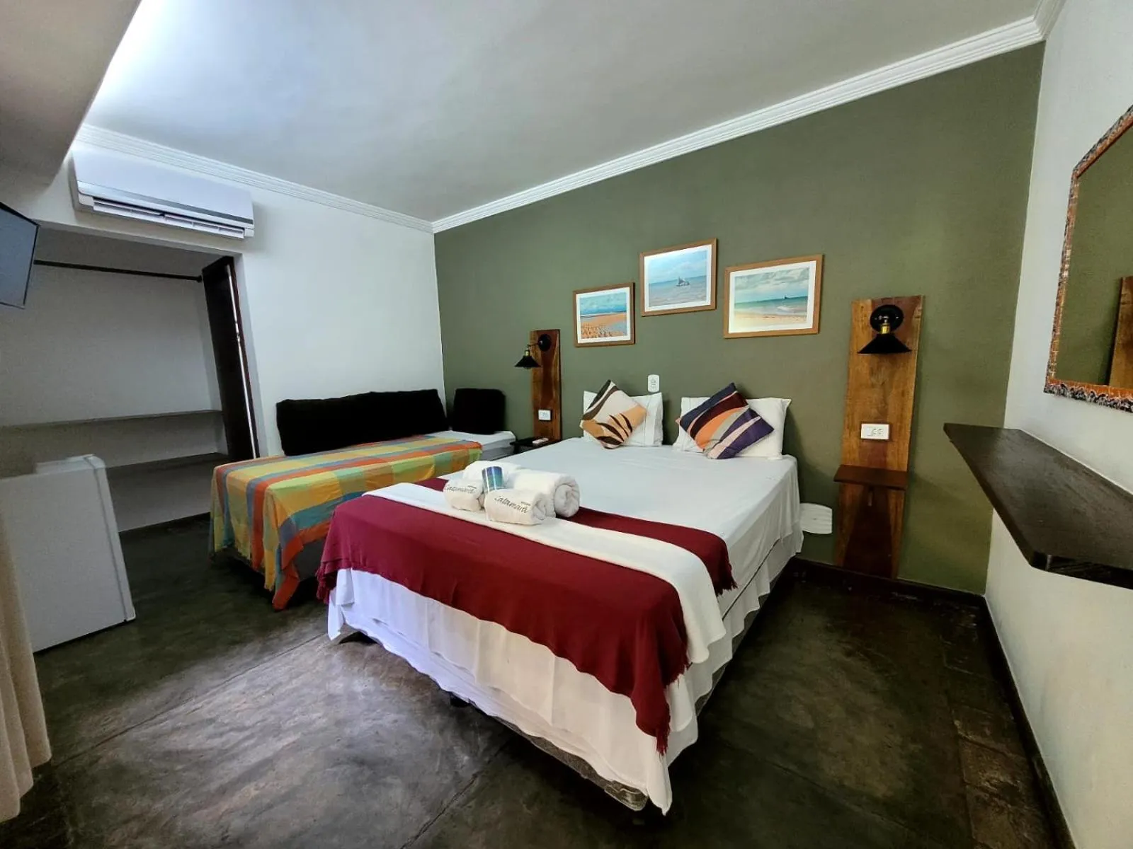 Bed in Pousada Catamara