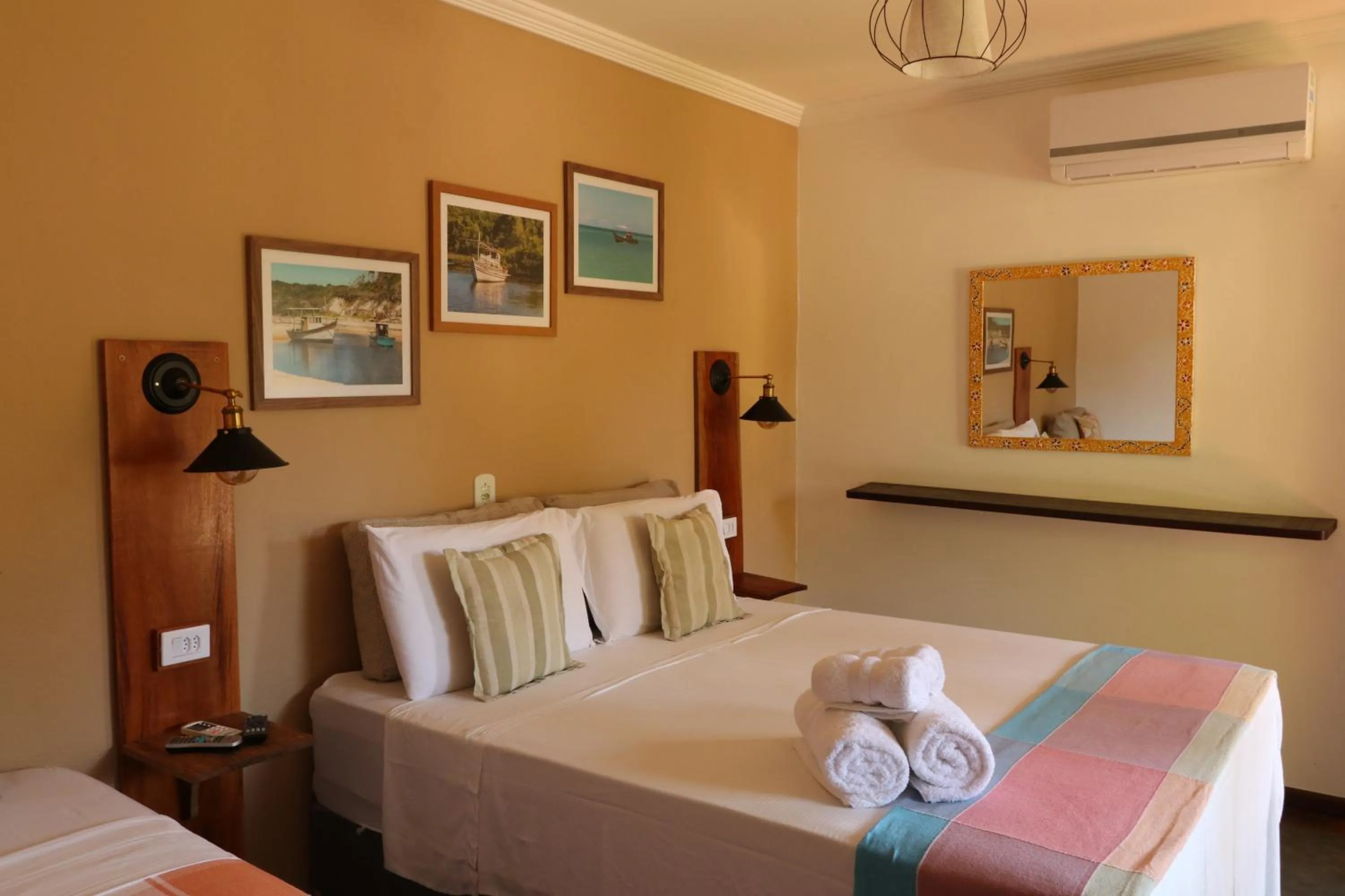 Bed in Pousada Catamara