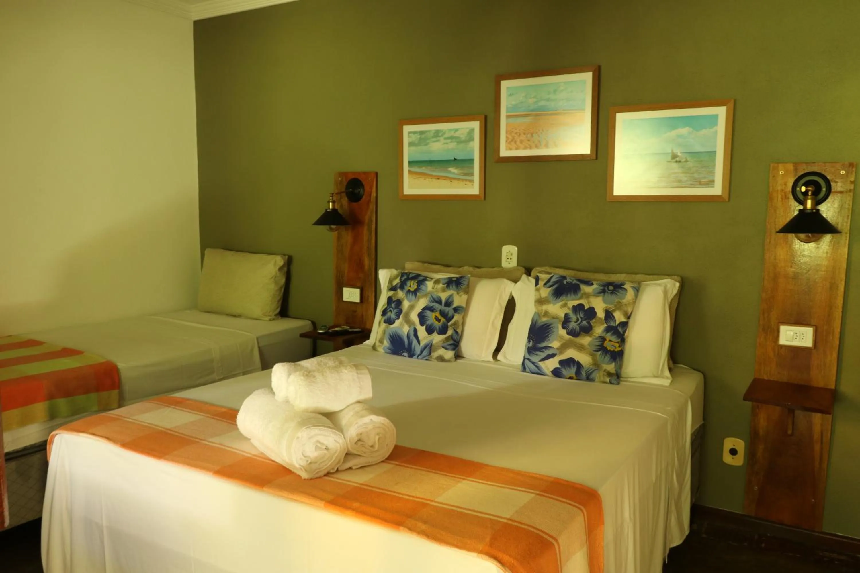 Bed in Pousada Catamara