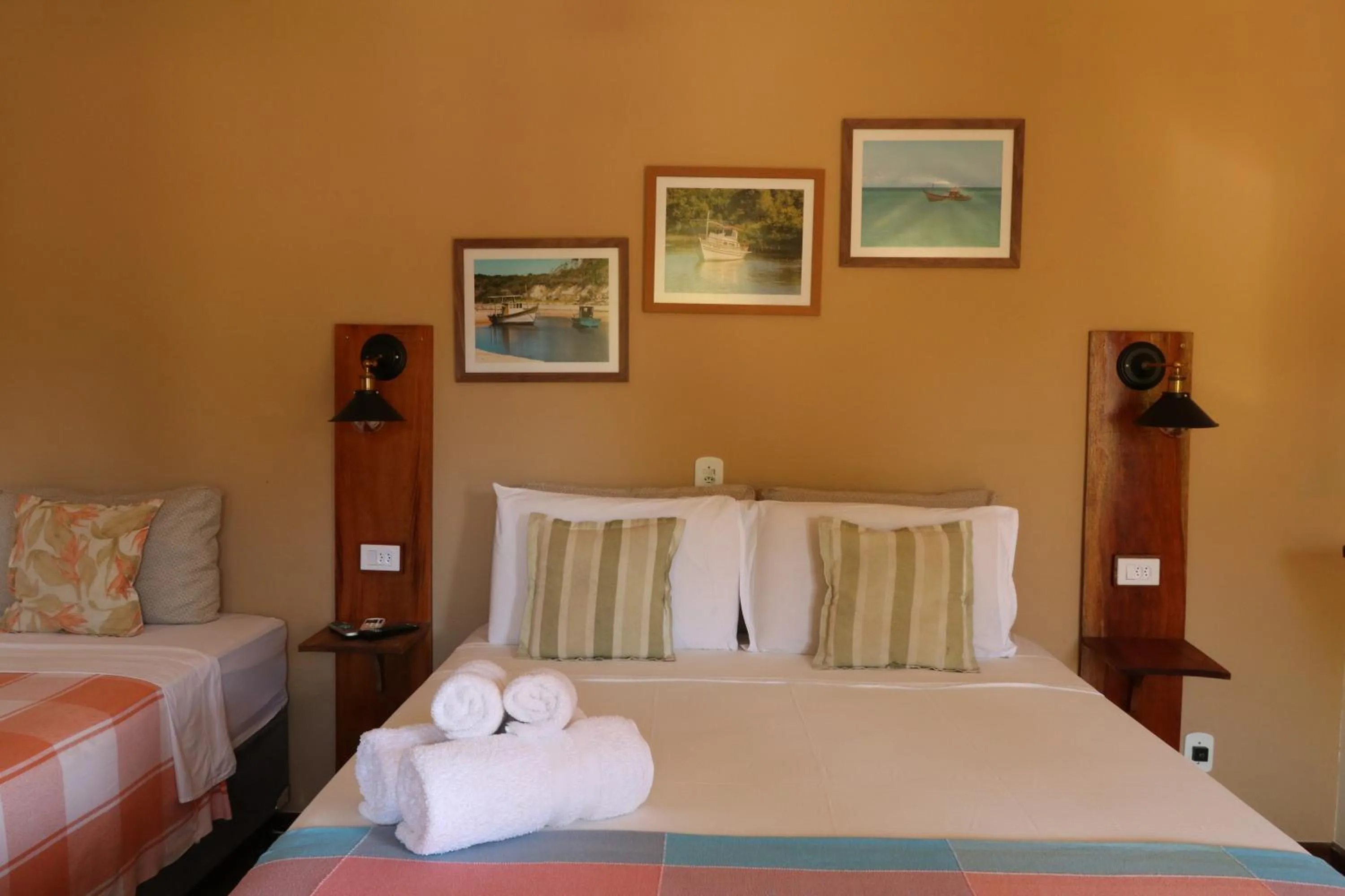 Bed in Pousada Catamara