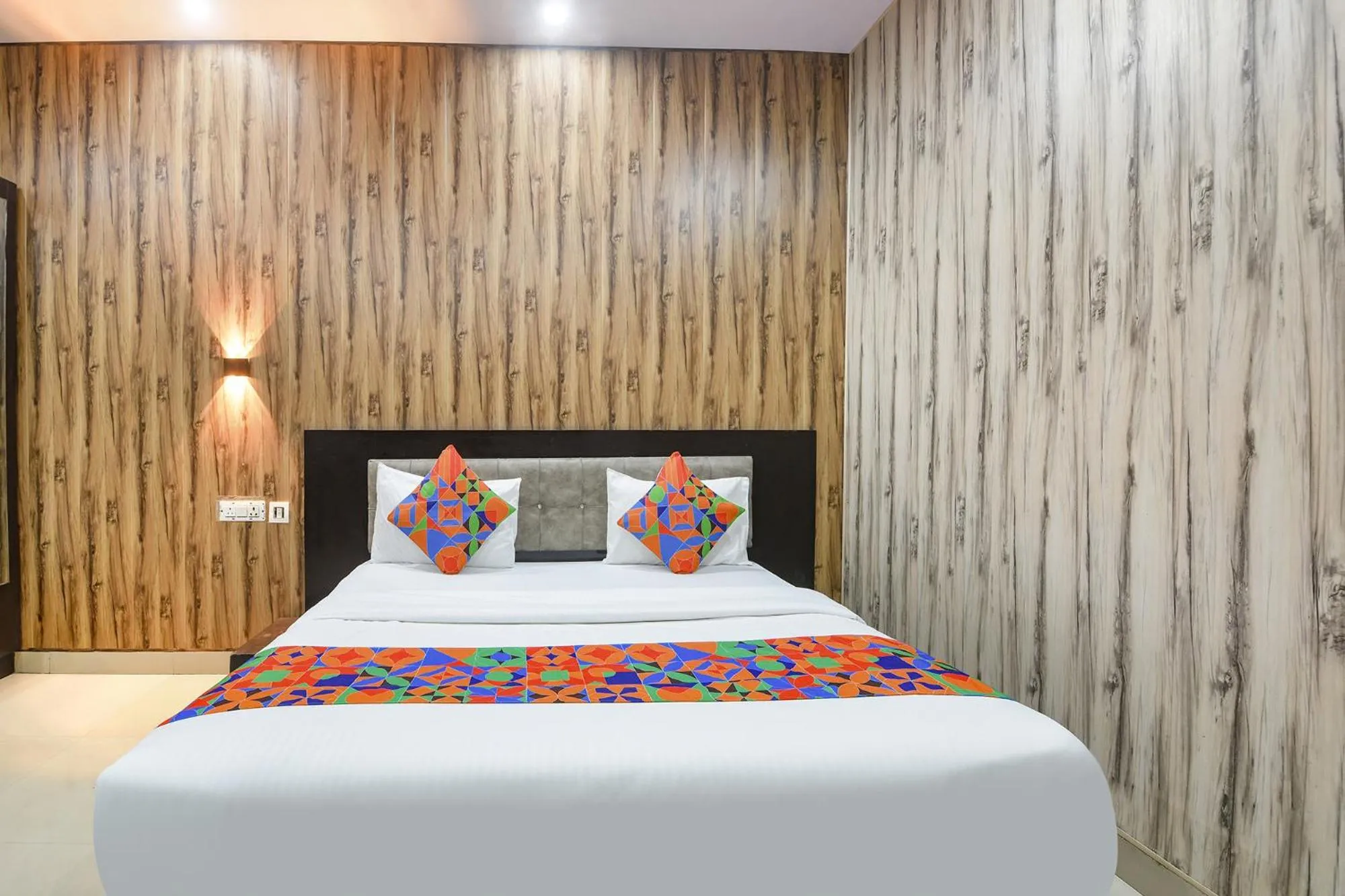 Bed in FabHotel Crown Residency