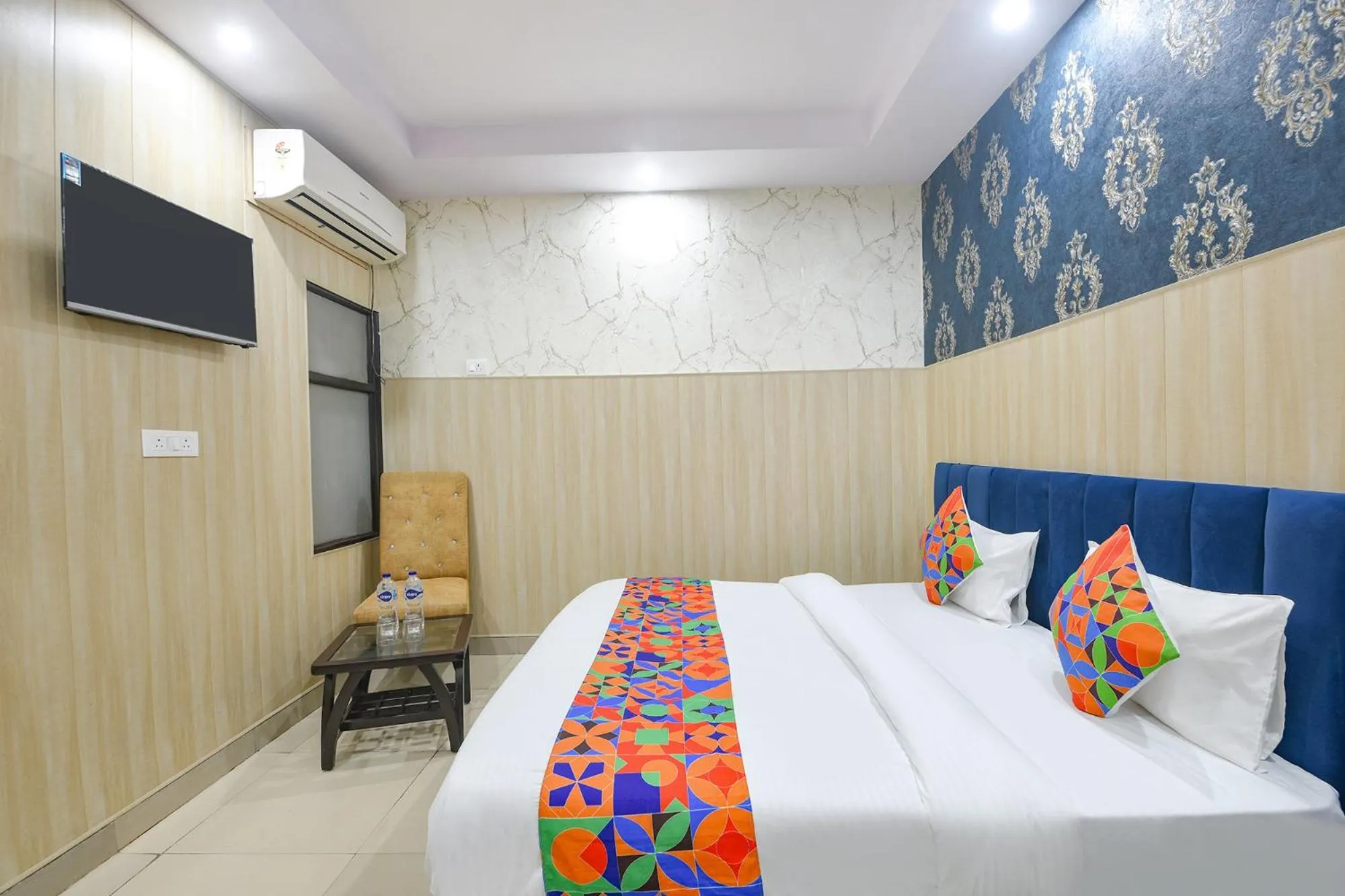 Bed in FabHotel Crown Residency