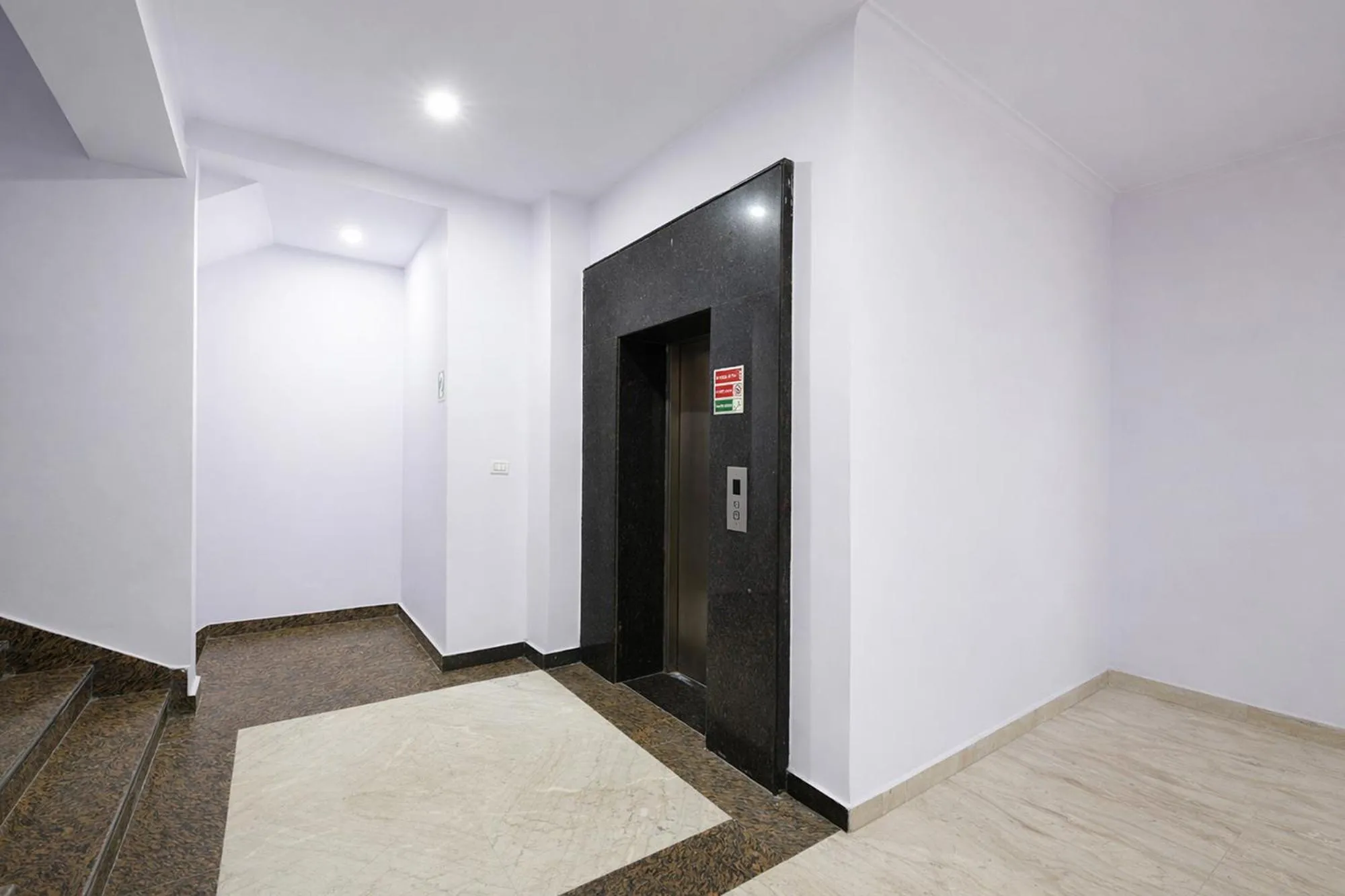 elevator in FabHotel Crown Residency
