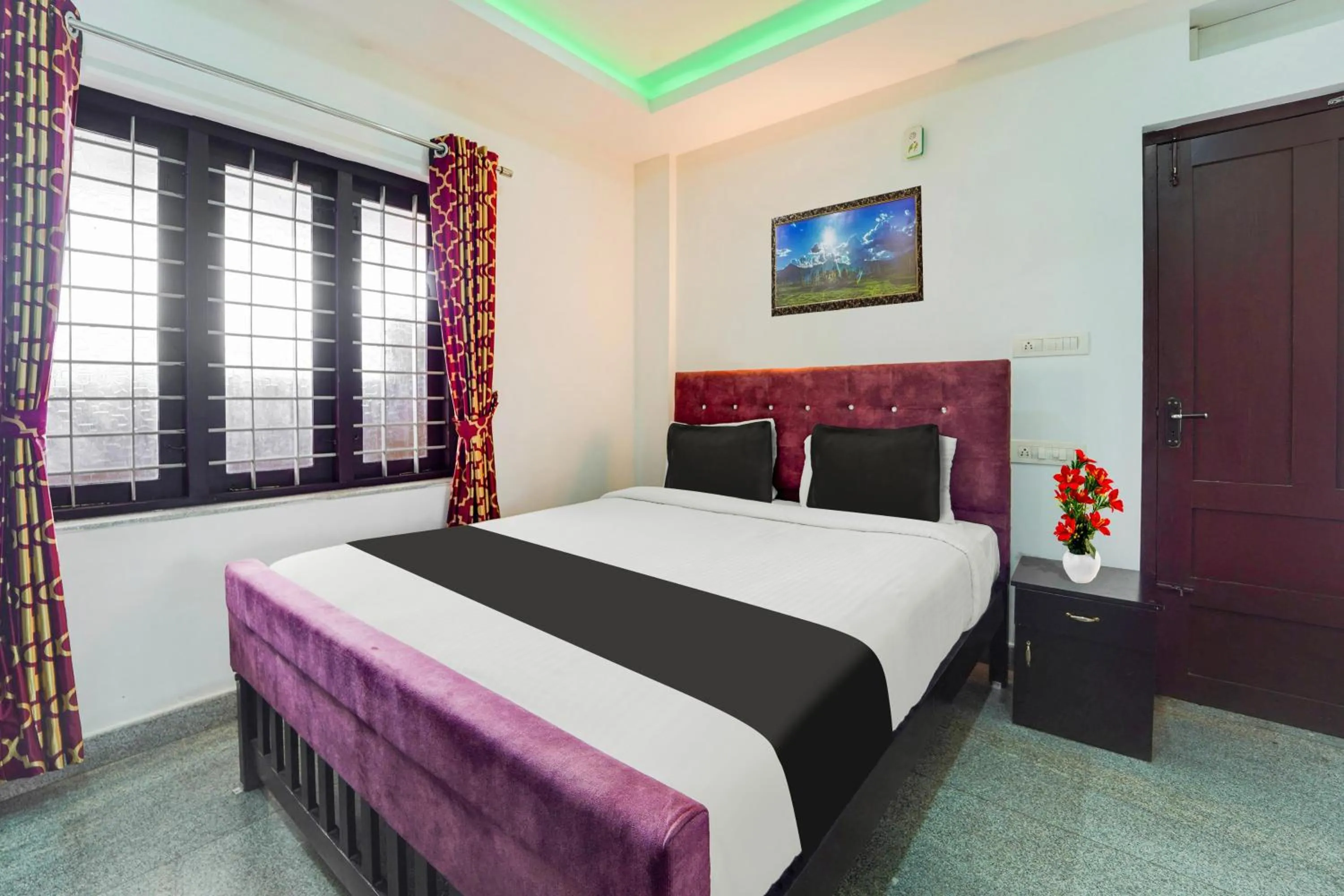Bedroom, Bed in Super Hotel O Aluva Town