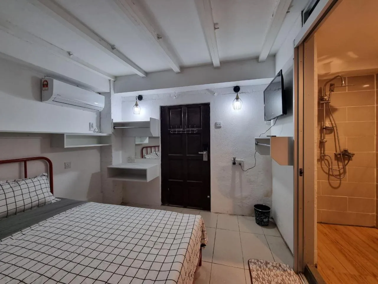 Bed in Kenyalang Urban Homestay