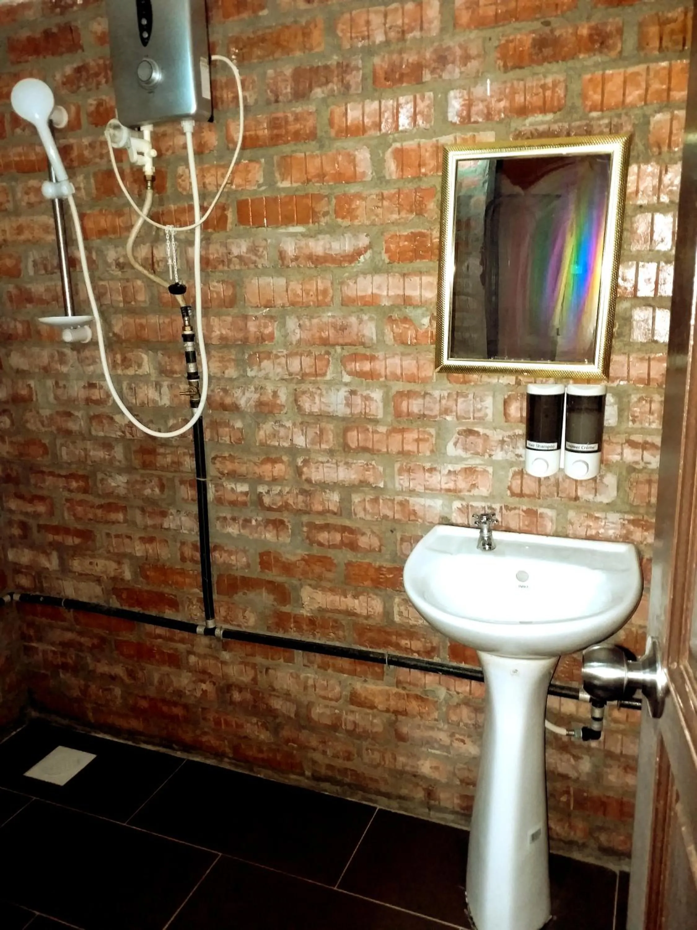Bathroom in Kenyalang Urban Homestay