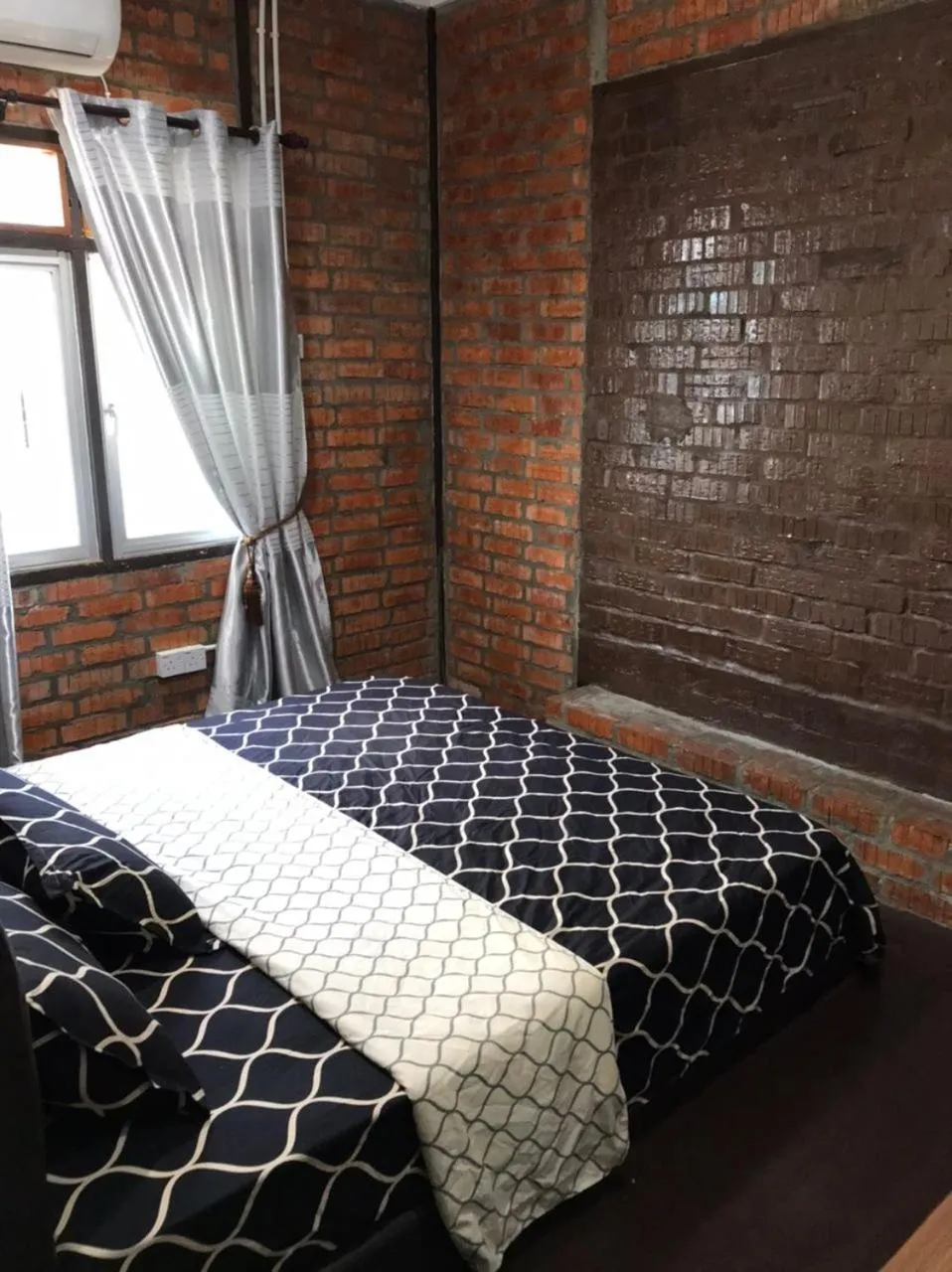 Bed in Kenyalang Urban Homestay