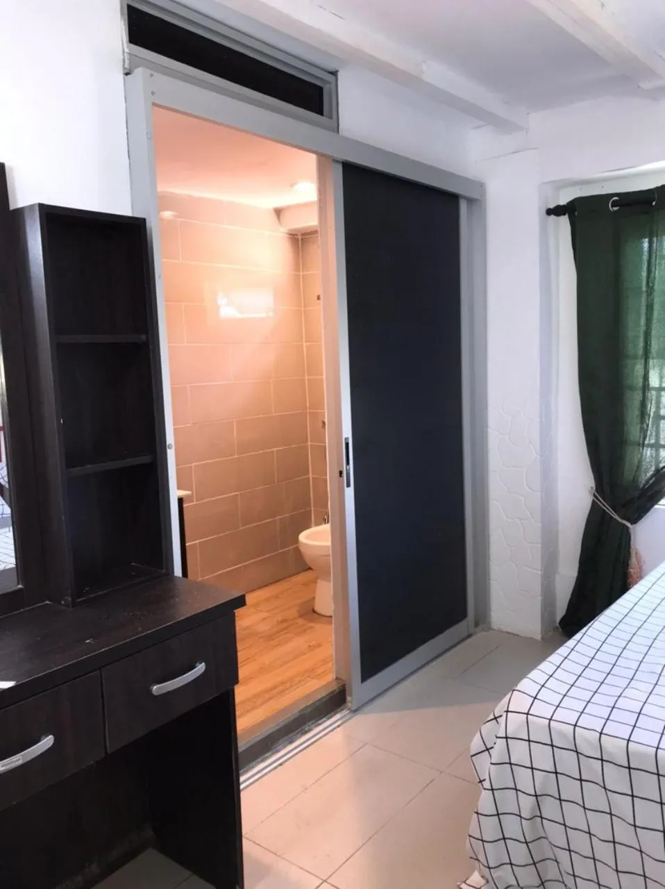 Bed in Kenyalang Urban Homestay