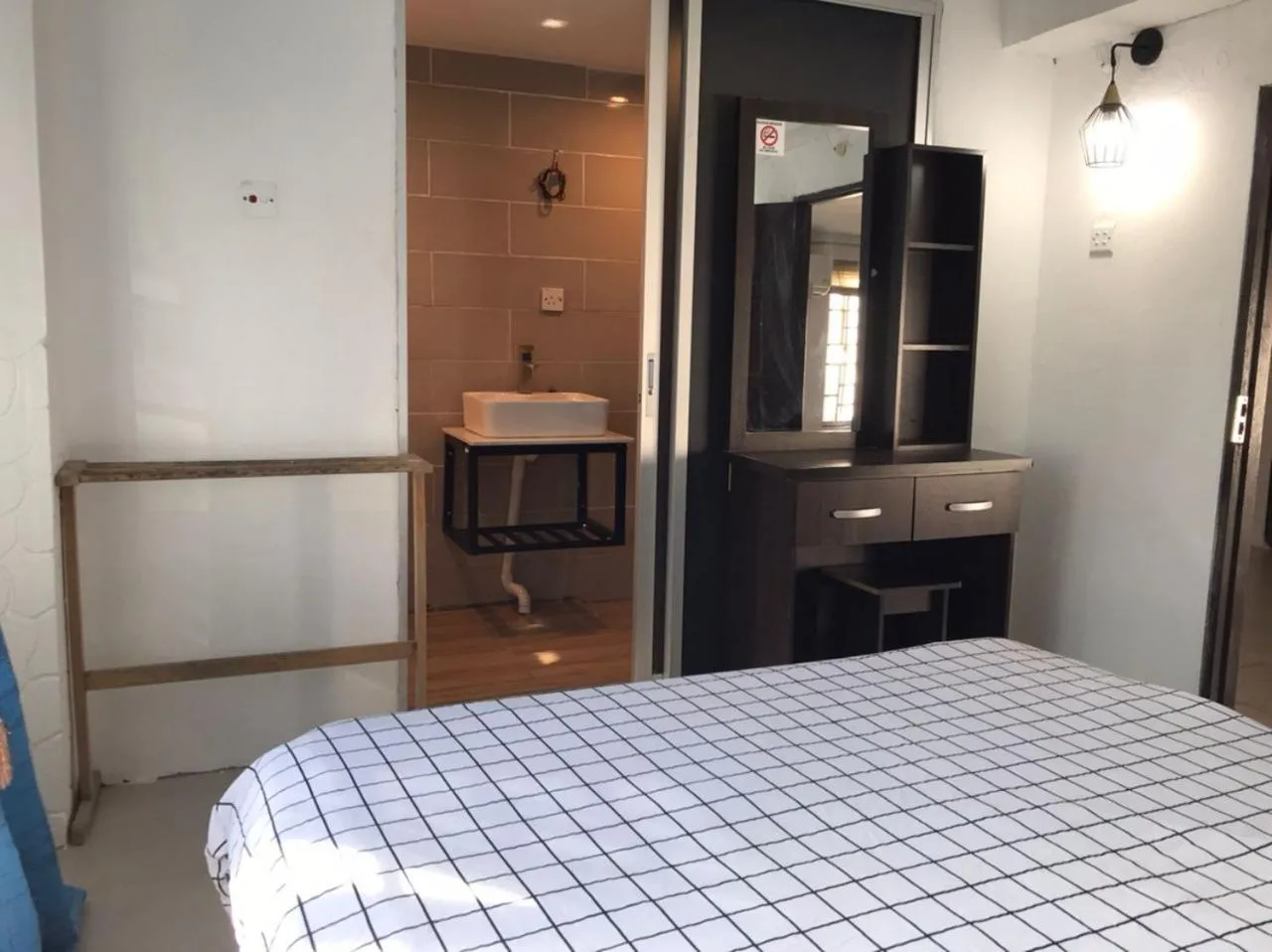 Bed in Kenyalang Urban Homestay