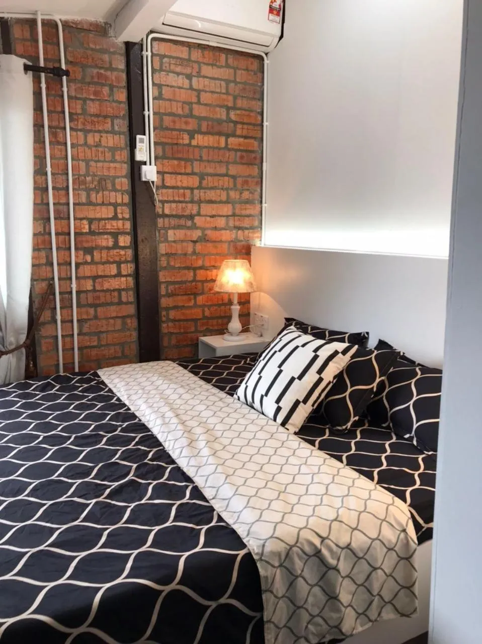 Bed in Kenyalang Urban Homestay