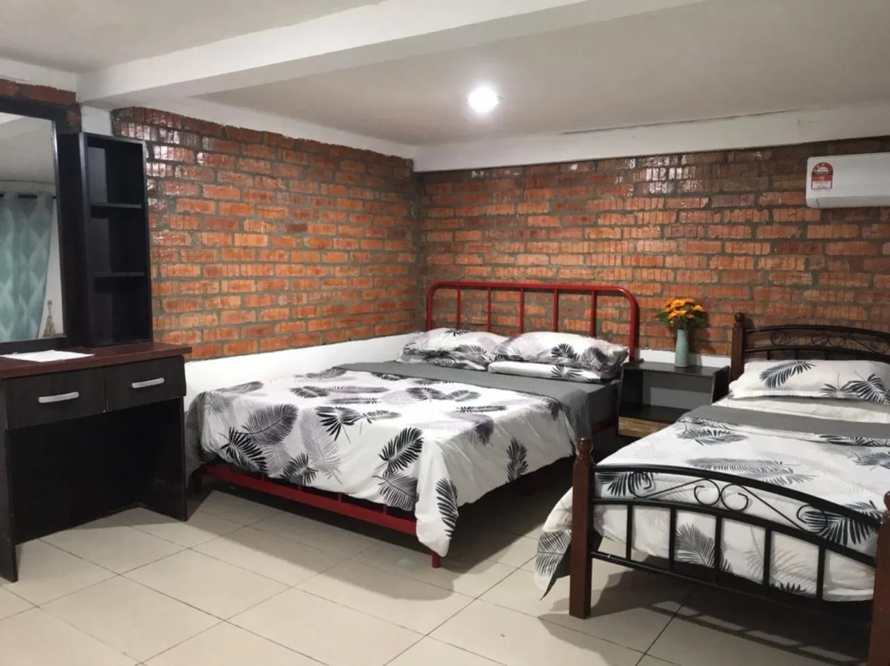 Bed in Kenyalang Urban Homestay