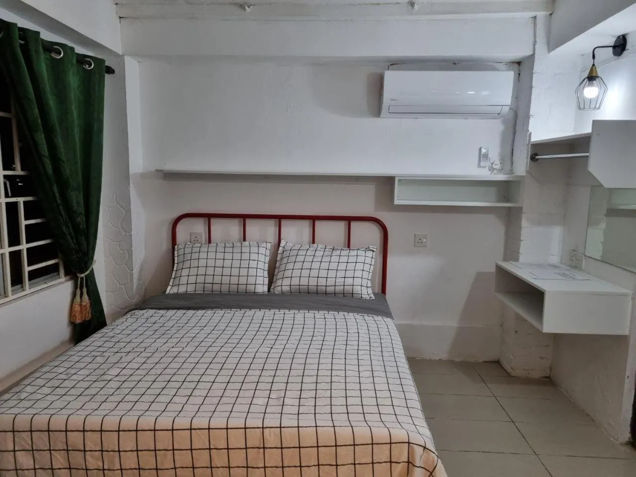 Bed in Kenyalang Urban Homestay