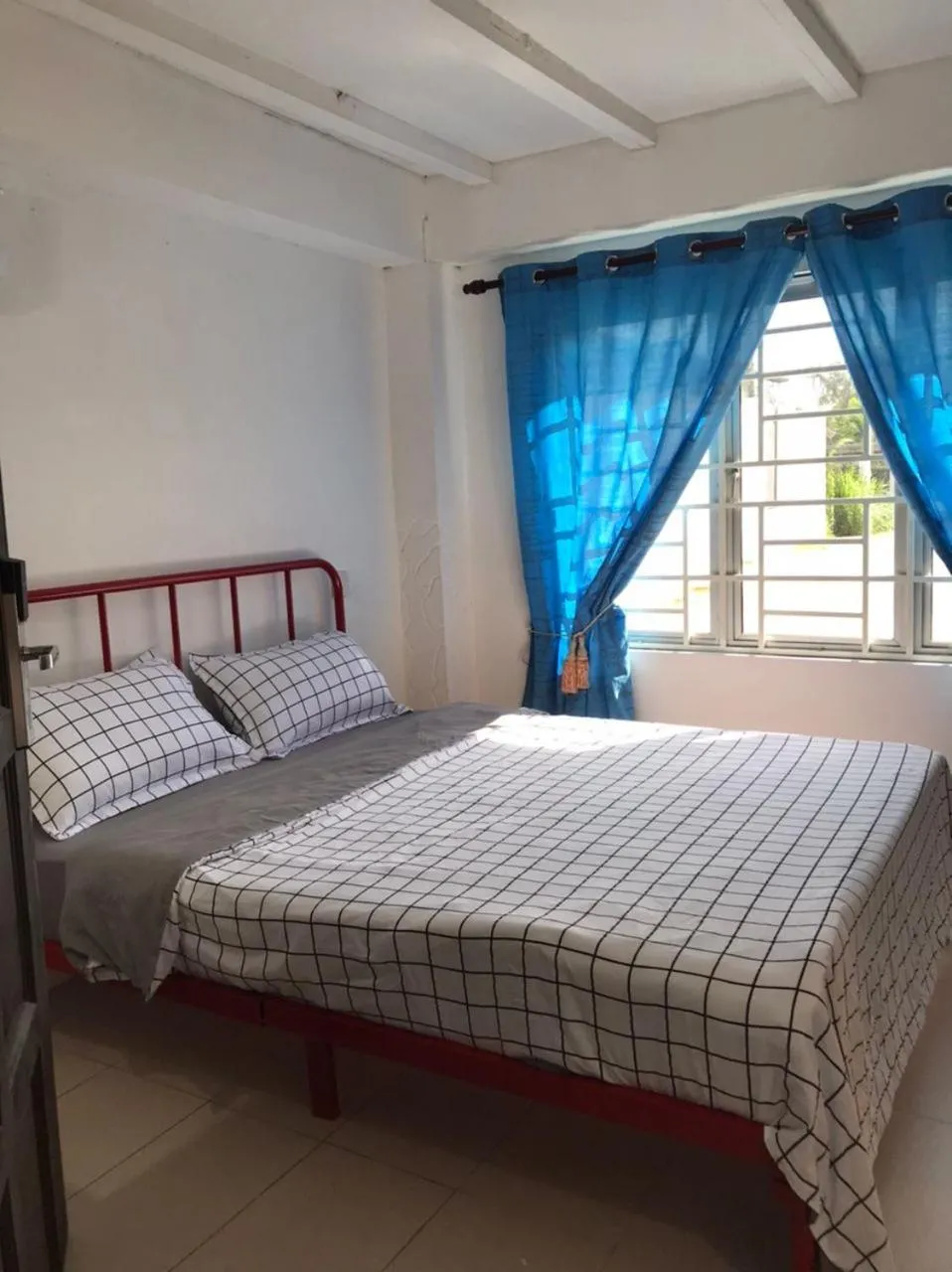 Bed in Kenyalang Urban Homestay